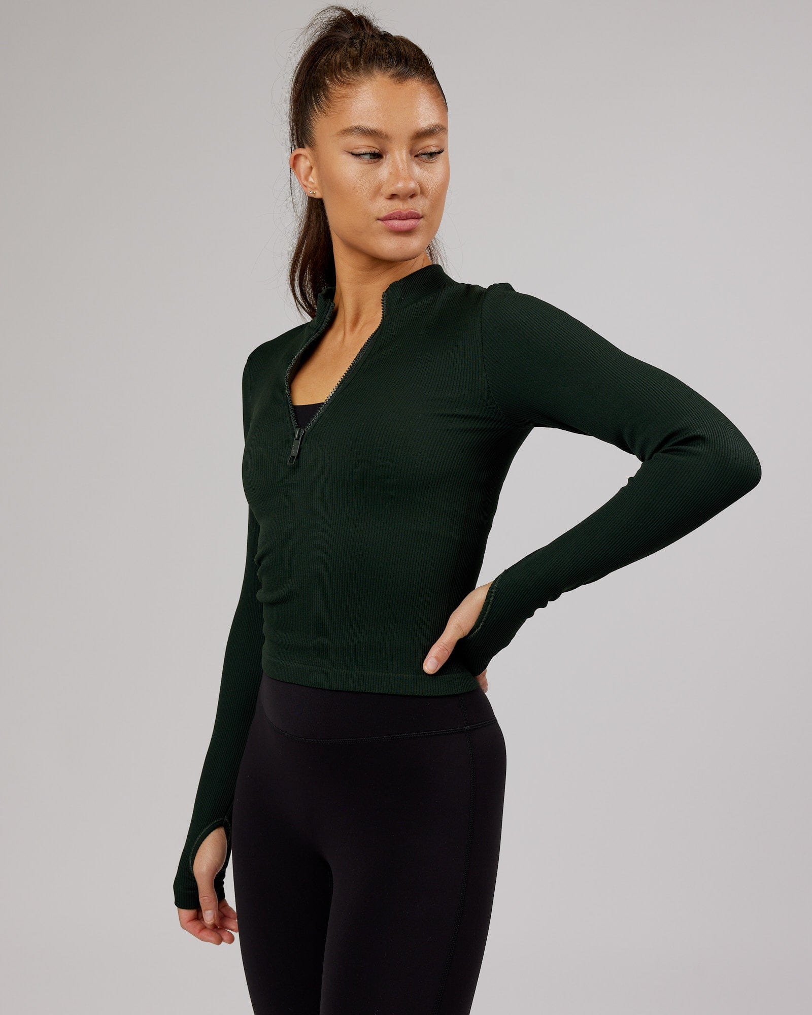Model wearing Minimal 1/4 Zip LS Top - Dark Forest