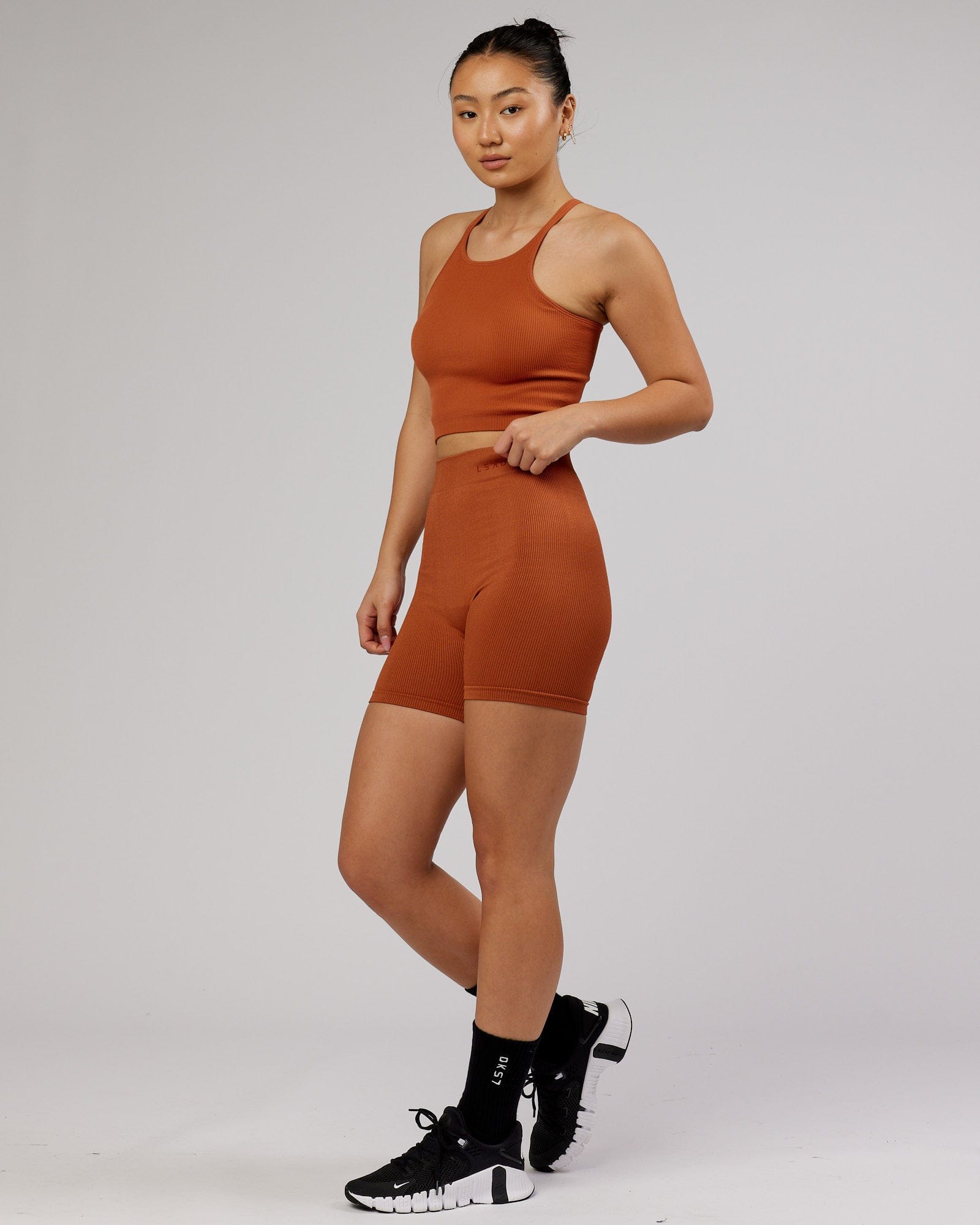 Model wearing Minimal Seamless Crop Ribbed Tank - Auburn