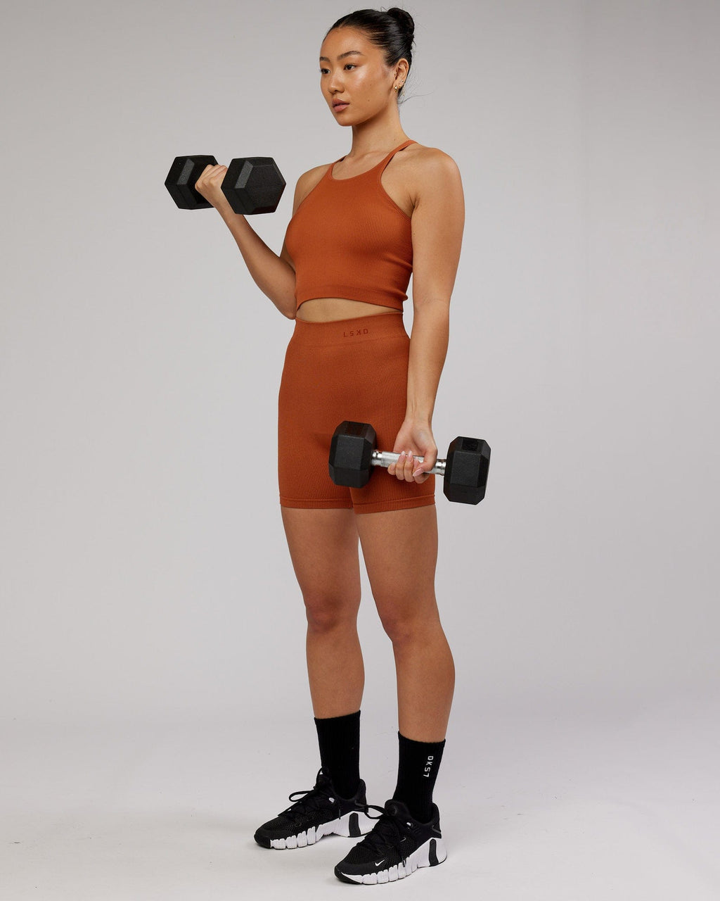Model wearing Minimal Seamless Crop Ribbed Tank - Auburn