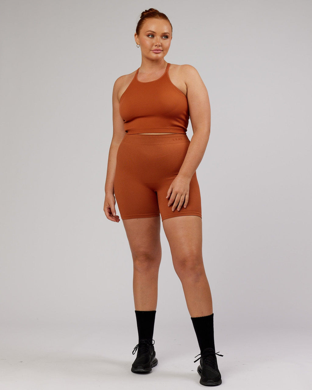 Model wearing Minimal Seamless Crop Ribbed Tank - Auburn