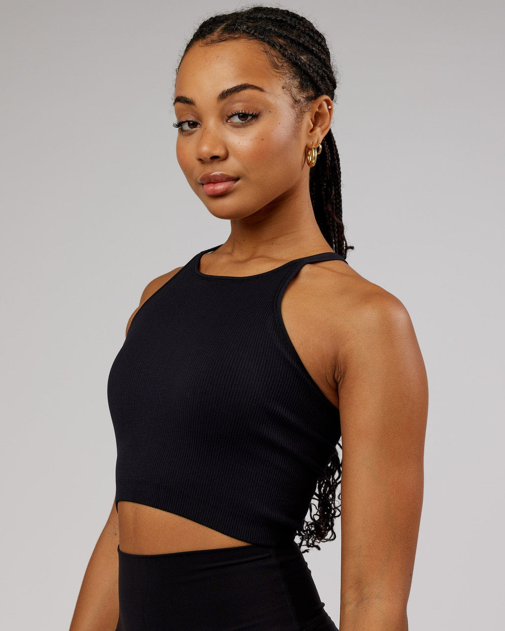 Model wearing Minimal Seamless Crop Ribbed Tank - Black
