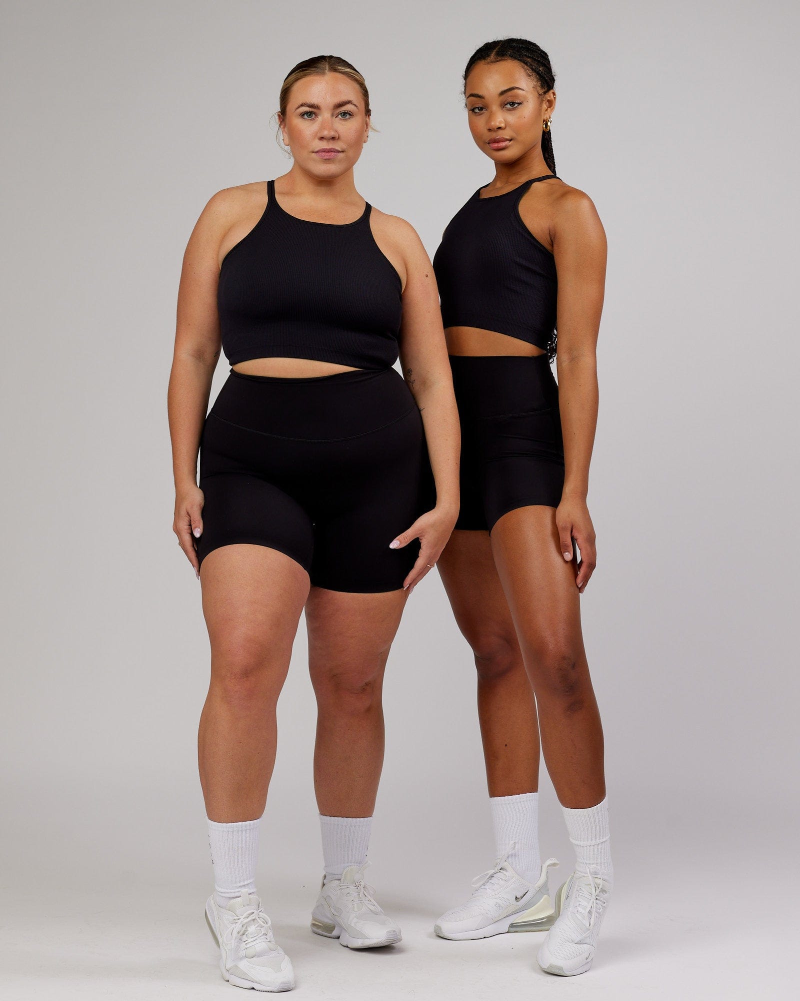 Model wearing Minimal Seamless Crop Ribbed Tank - Black