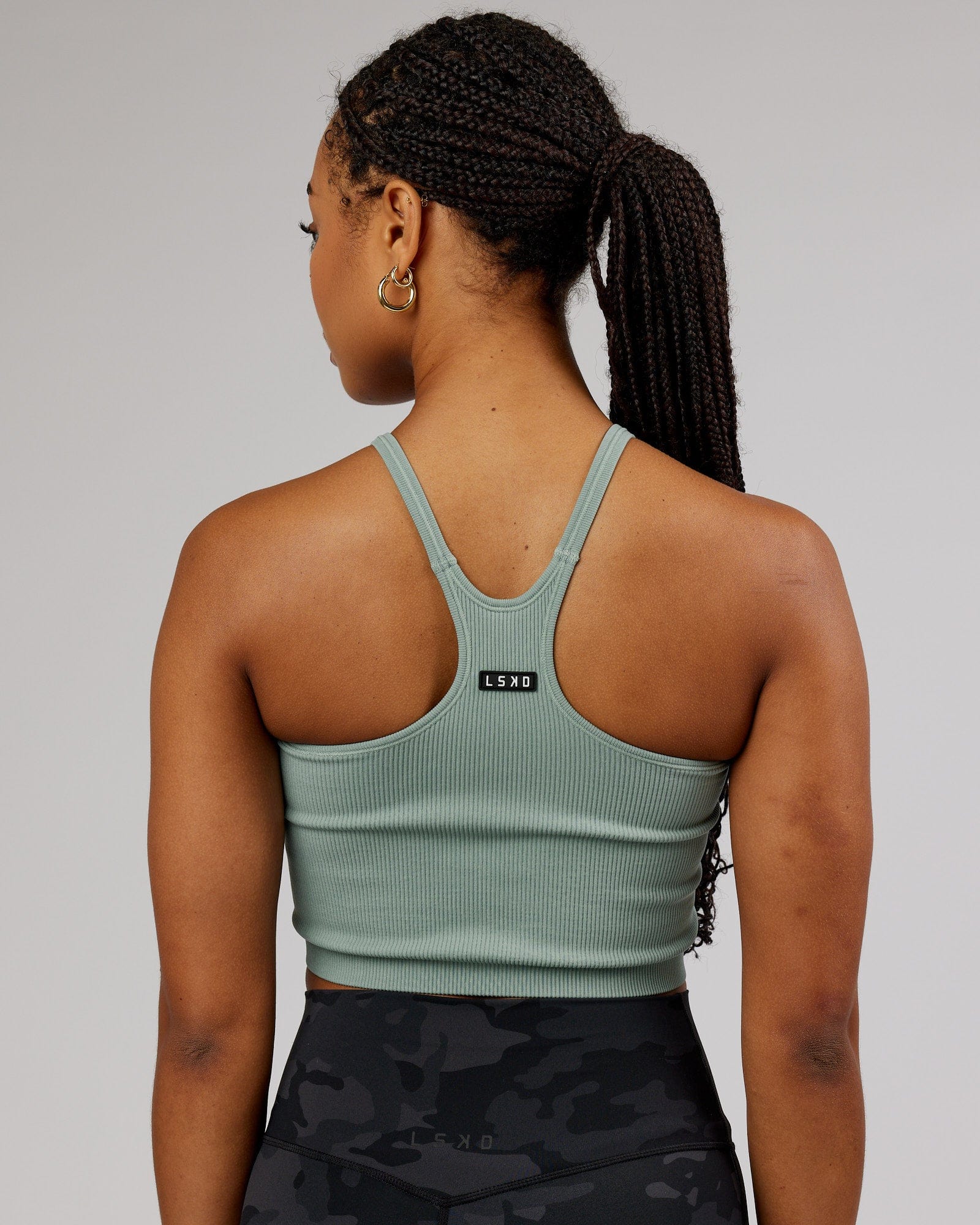 Model wearing Minimal Seamless Crop Ribbed Tank - Frost