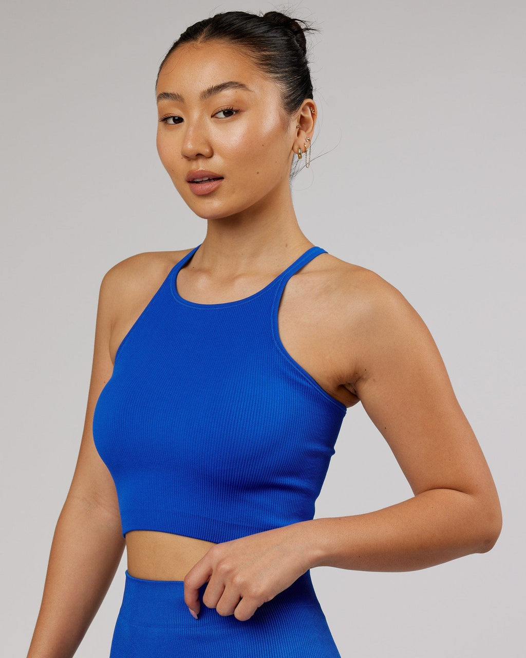 Model wearing Minimal Seamless Crop Ribbed Tank - Strong Blue