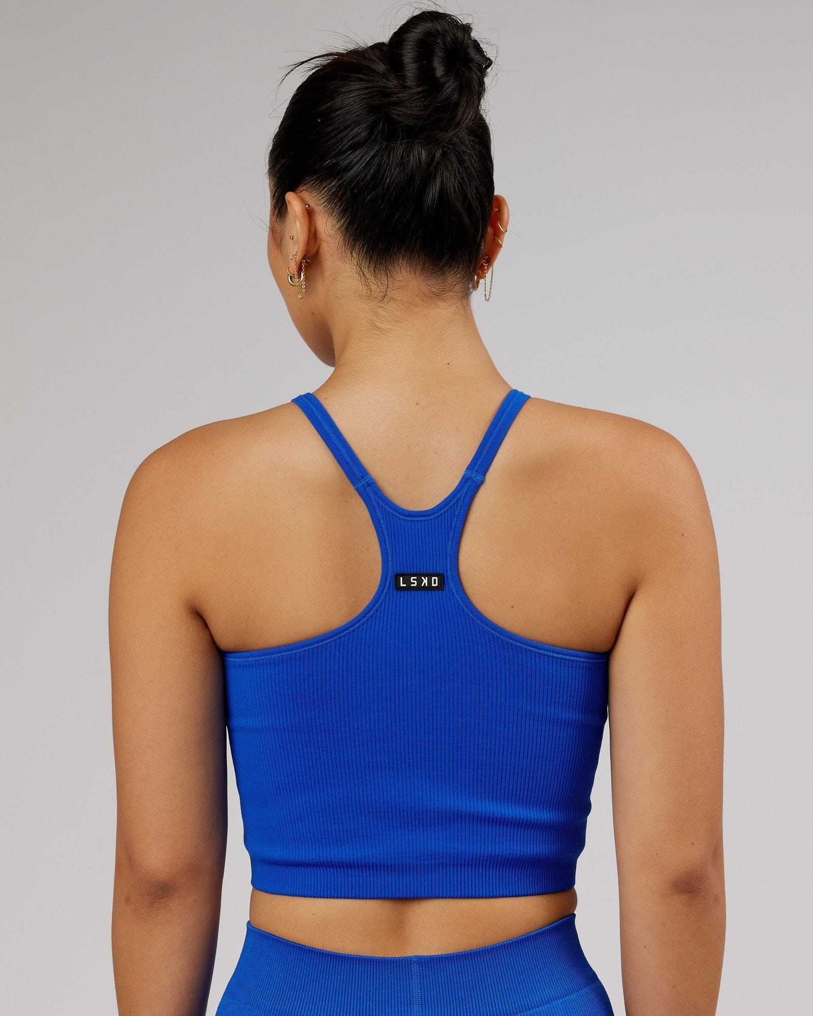 Model wearing Minimal Seamless Crop Ribbed Tank - Strong Blue