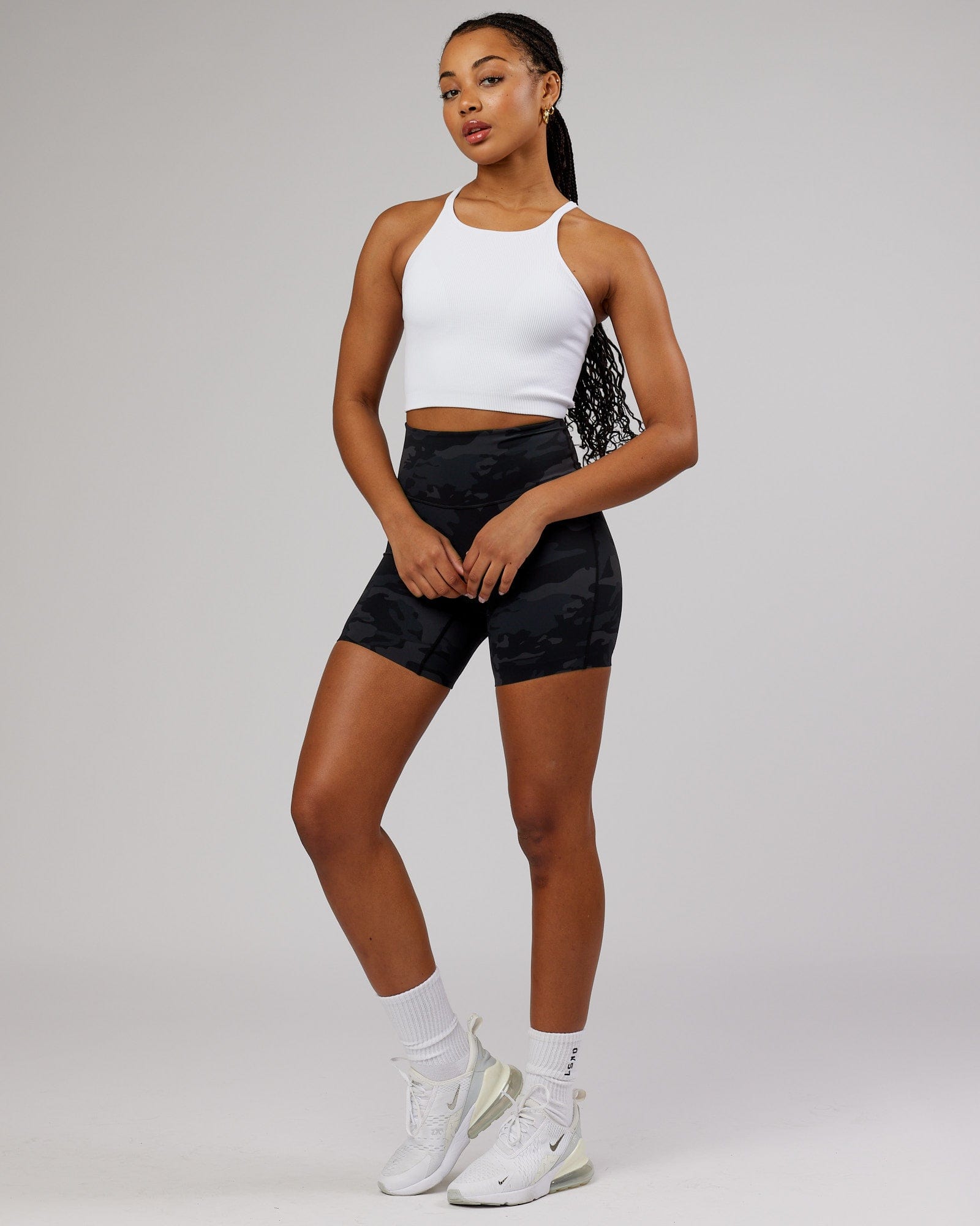 Model wearing Minimal Seamless Crop Ribbed Tank - White