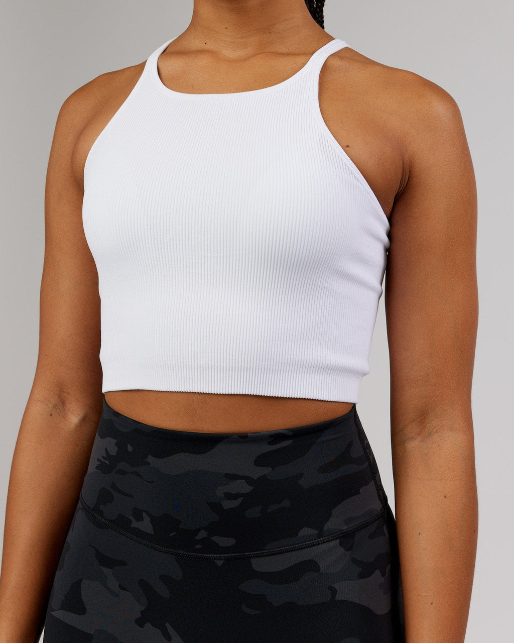 Model wearing Minimal Seamless Crop Ribbed Tank - White
