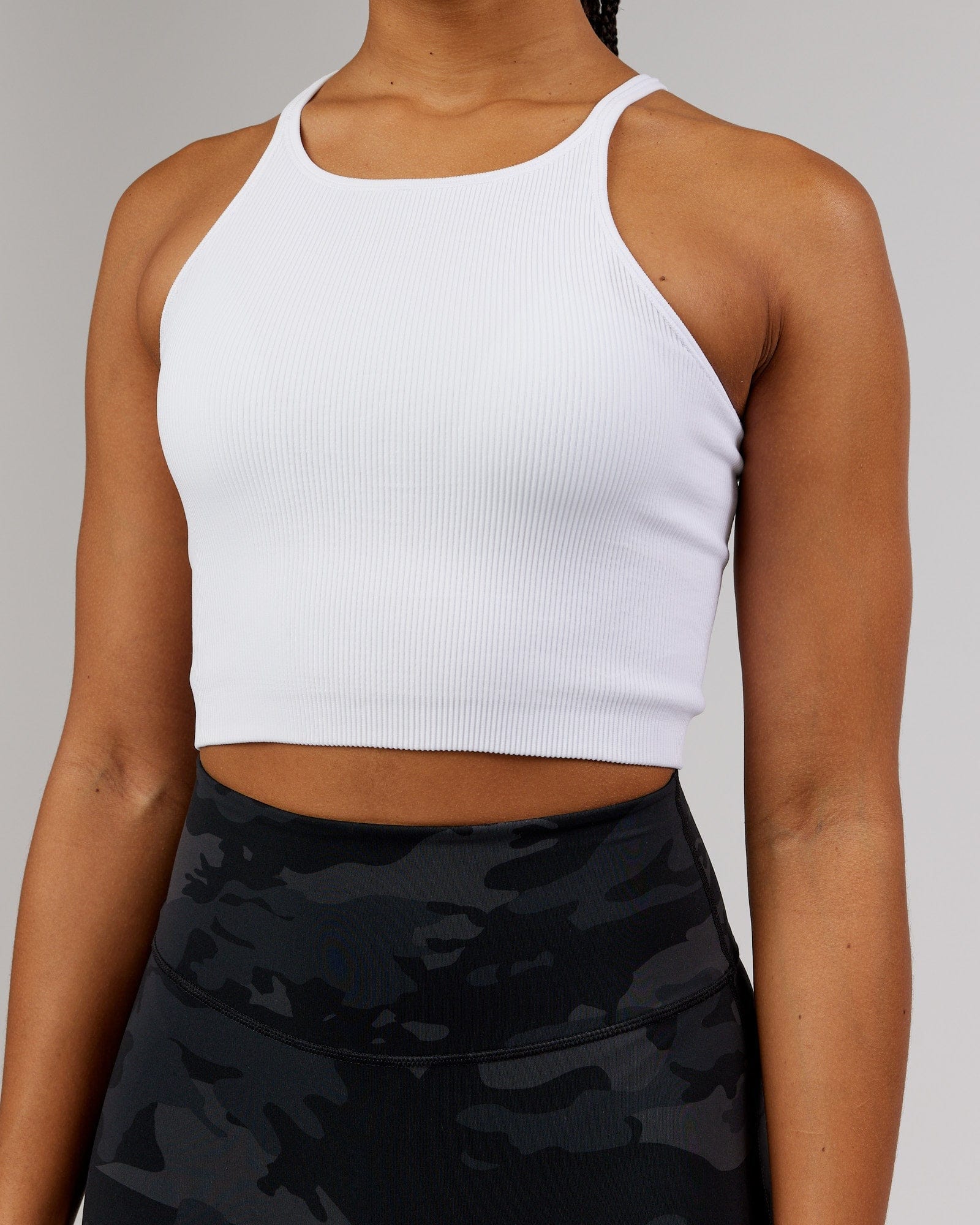 Model wearing Minimal Seamless Crop Ribbed Tank - White