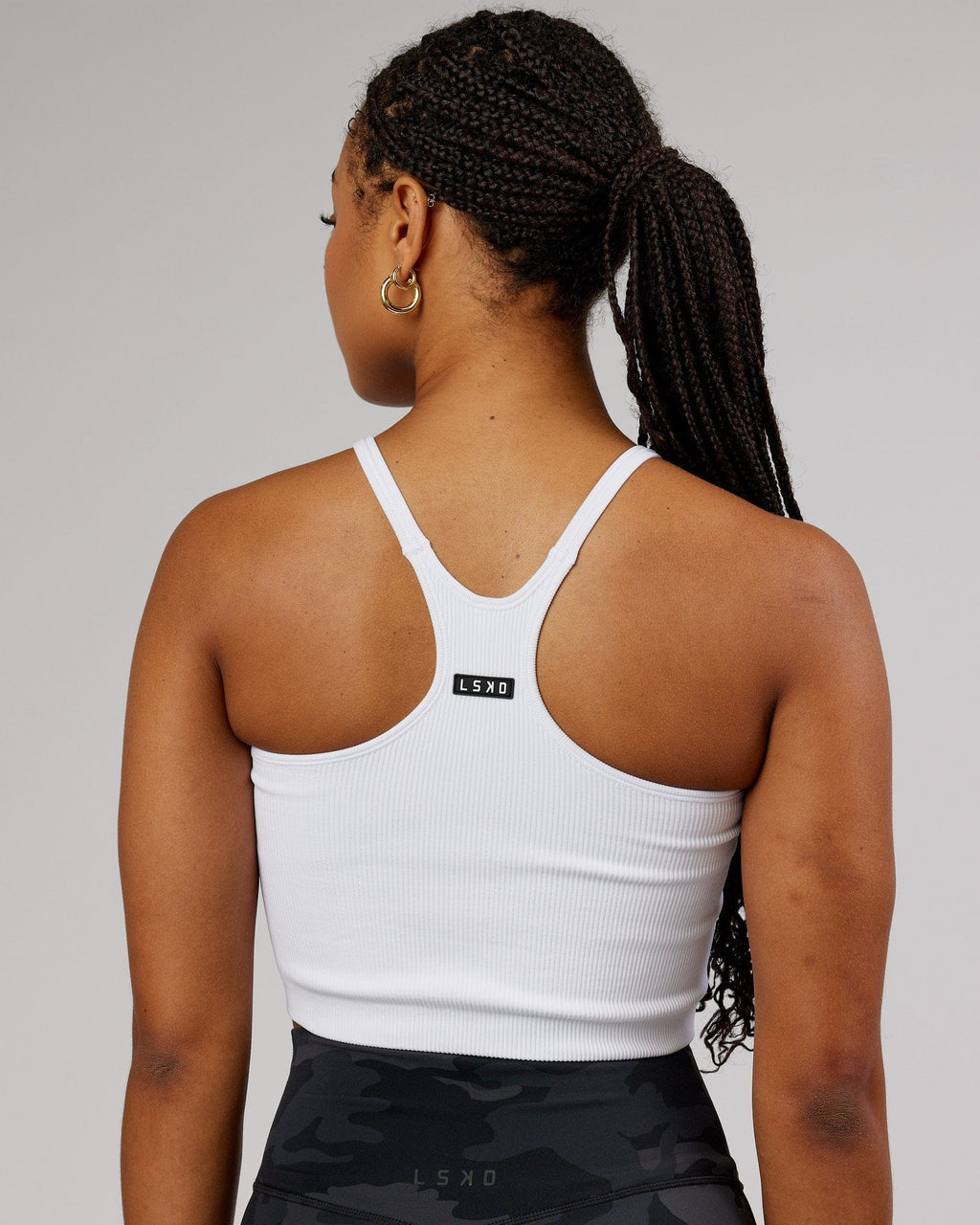 Model wearing Minimal Seamless Crop Ribbed Tank - White