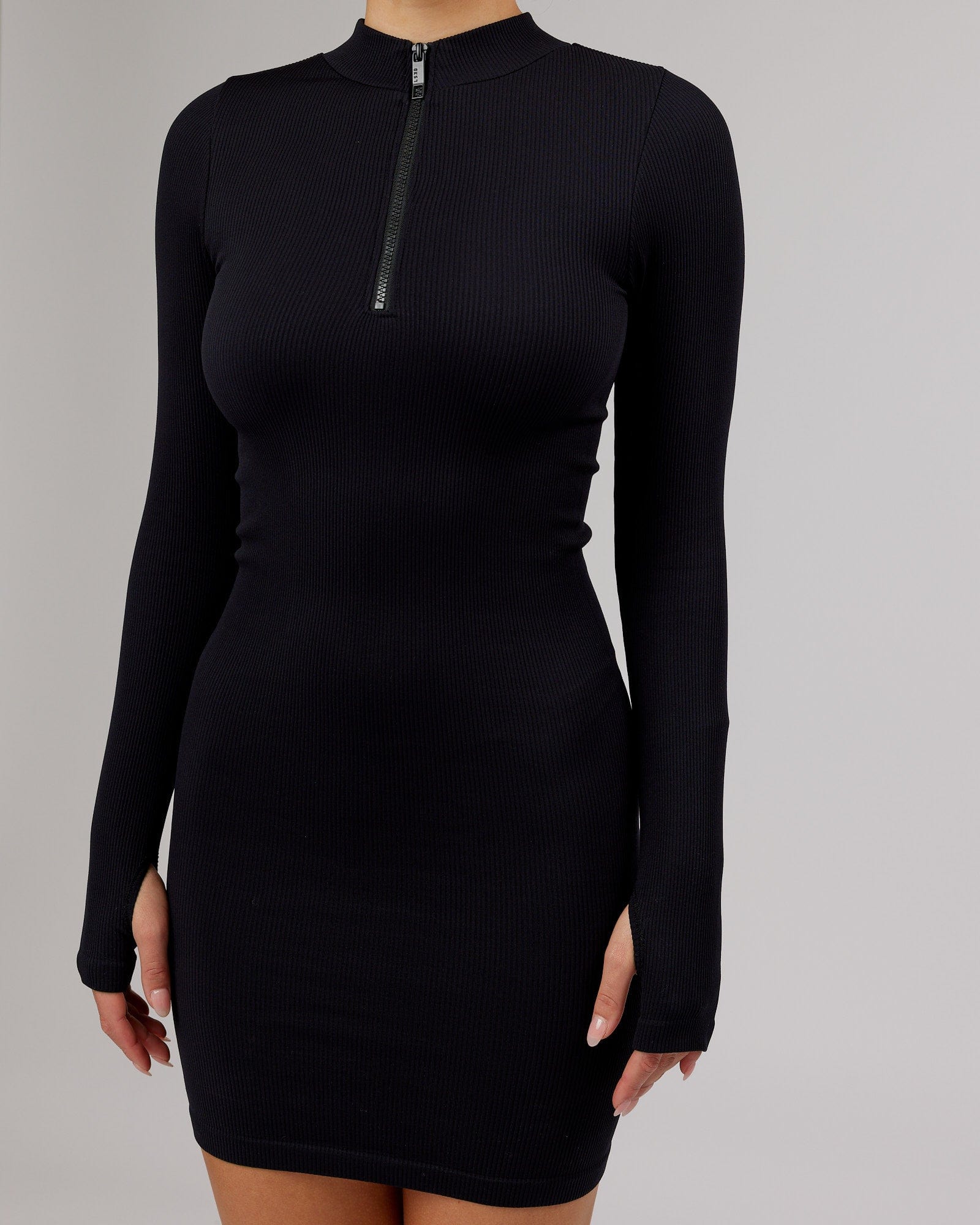 Model wearing Minimal Ribbed Seamless LS Dress - Black