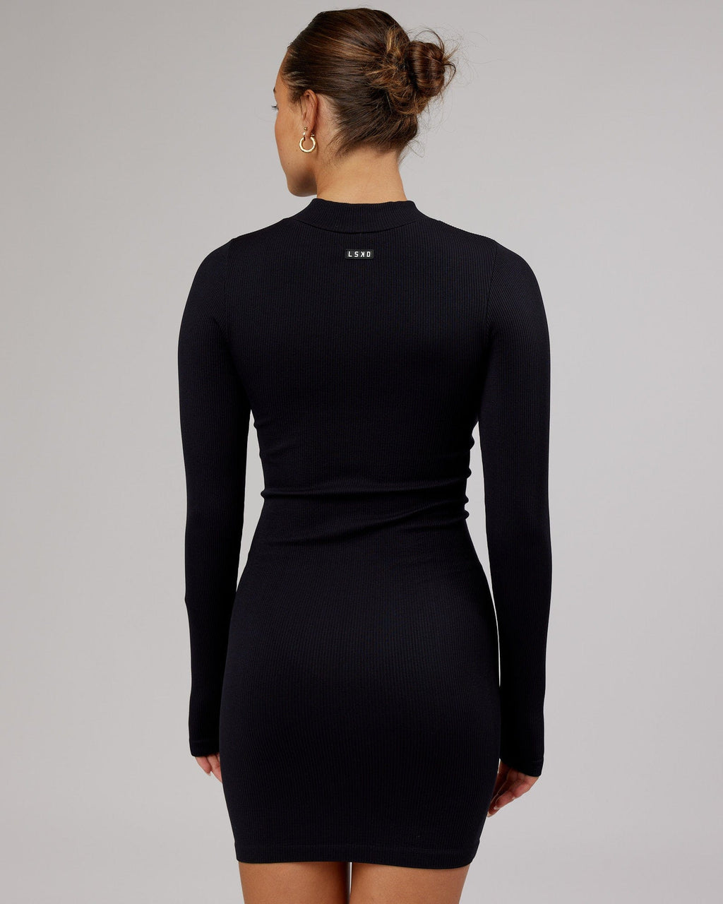 Model wearing Minimal Ribbed Seamless LS Dress - Black