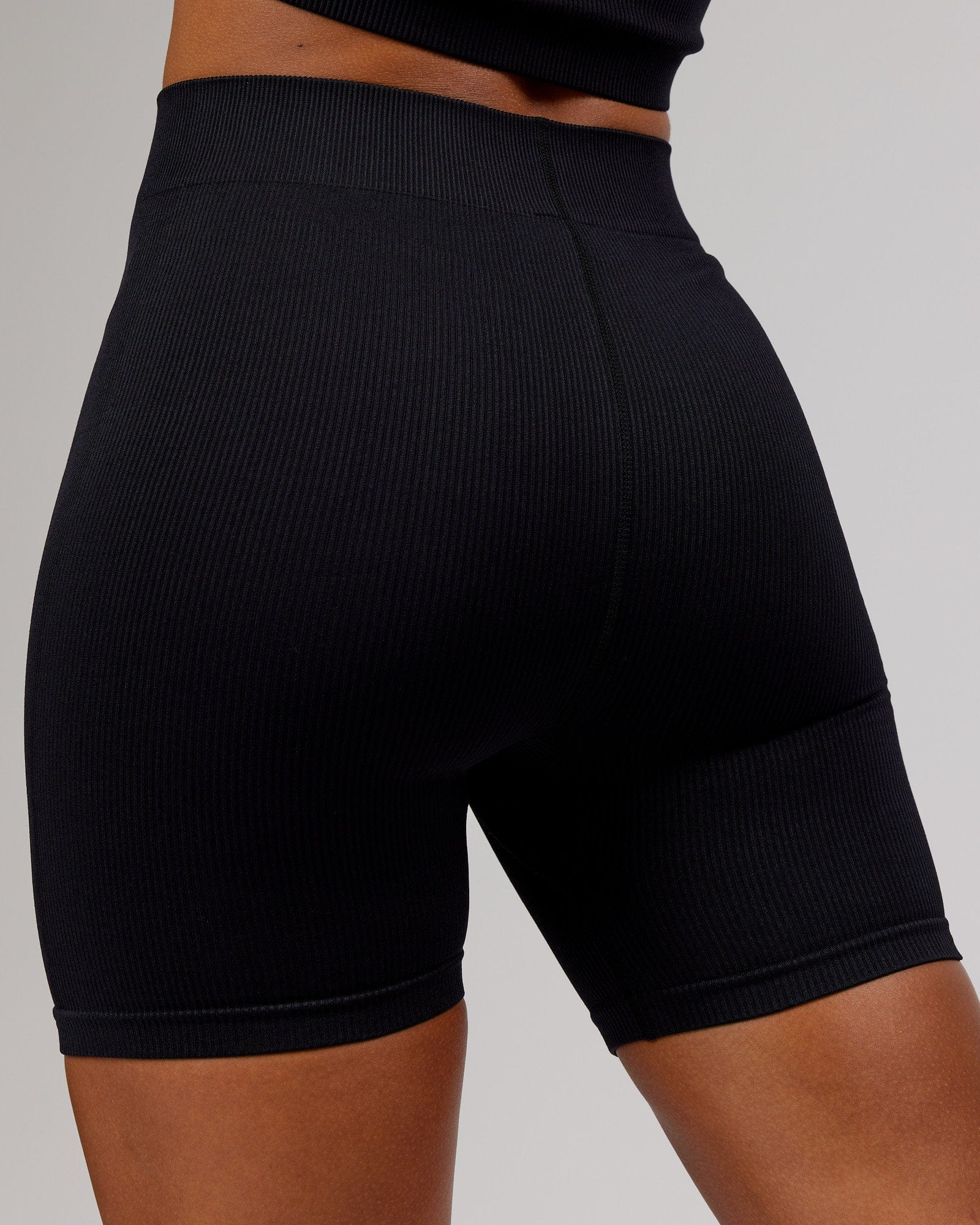 Model wearing Minimal Ribbed Seamless Shorts - Black