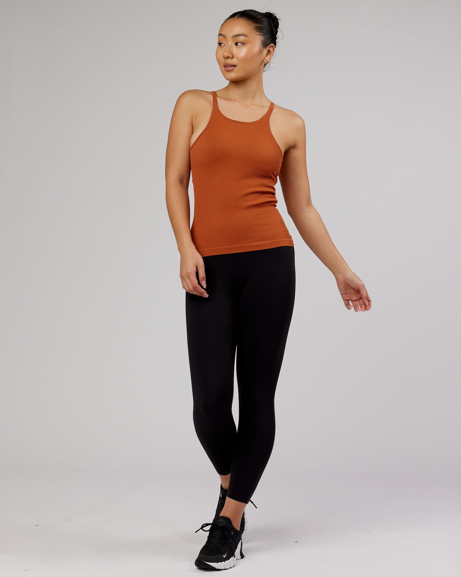Model wearing Minimal Seamless Ribbed Tank - Auburn