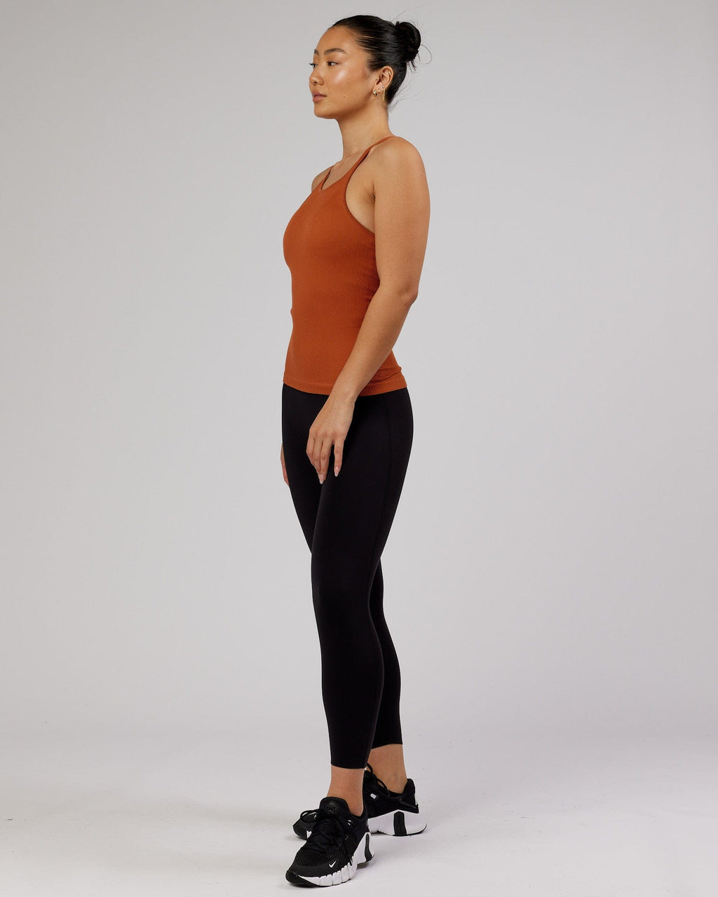 Model wearing Minimal Seamless Ribbed Tank - Auburn