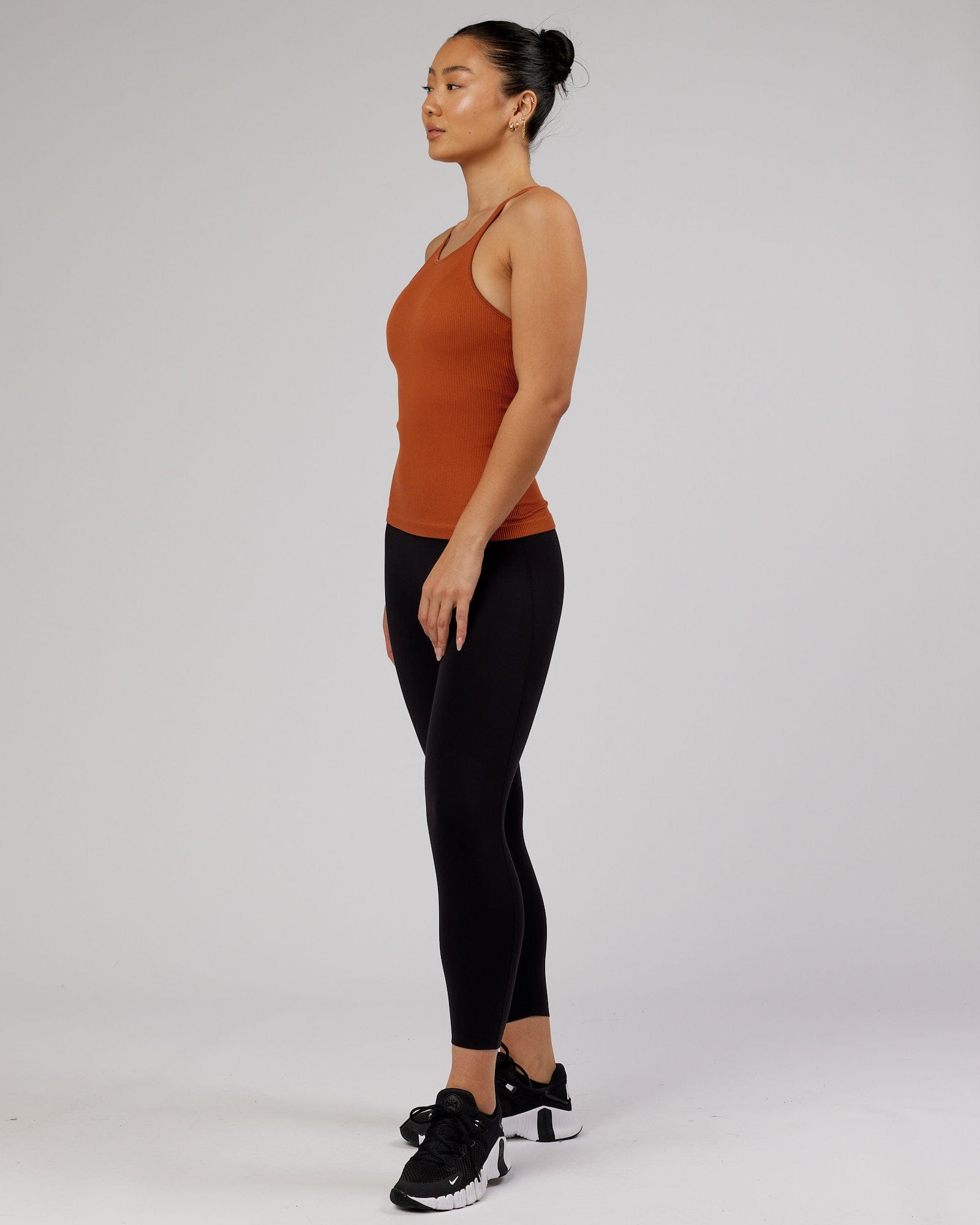 Model wearing Minimal Seamless Ribbed Tank - Auburn
