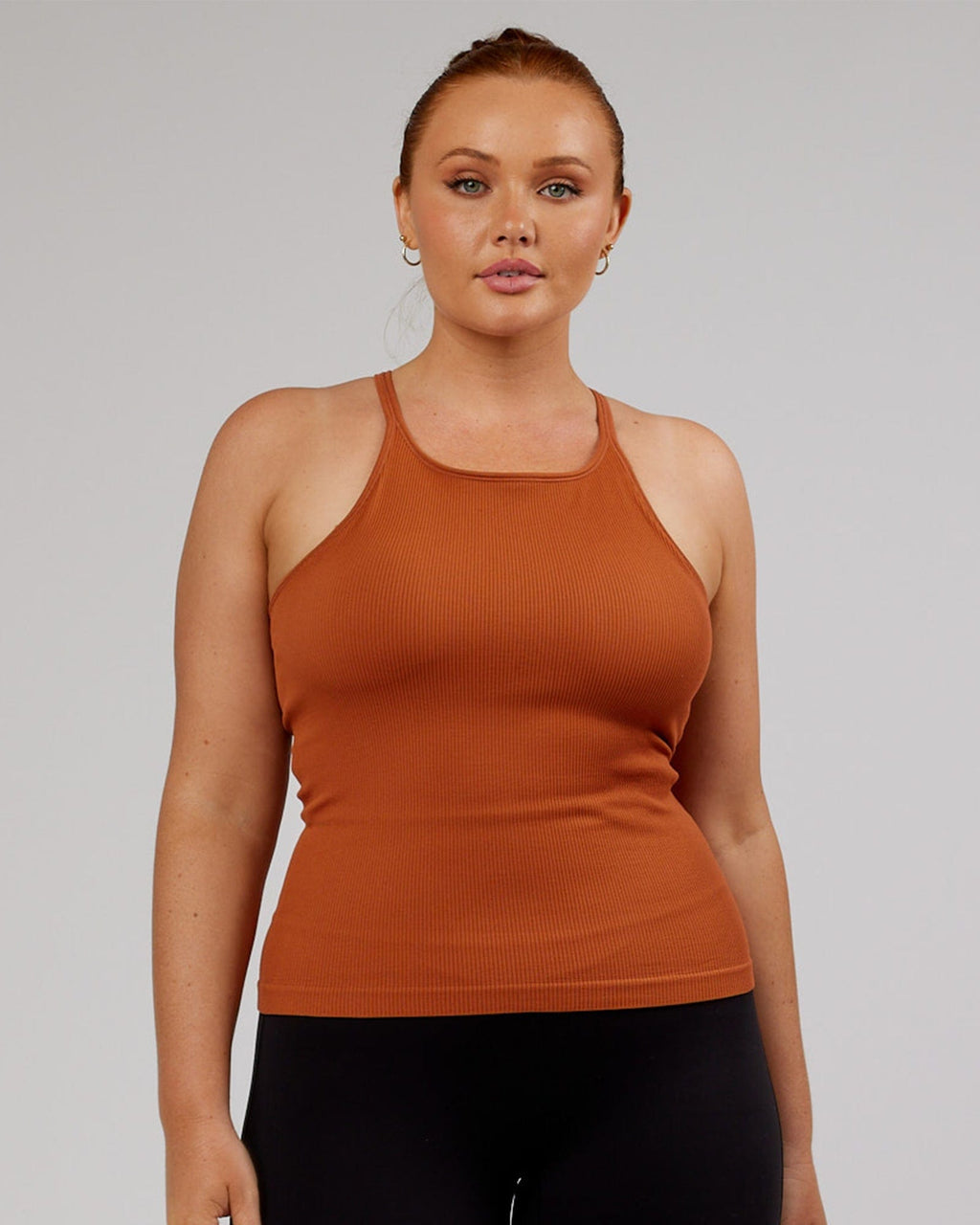 Model wearing Minimal Seamless Ribbed Tank - Auburn