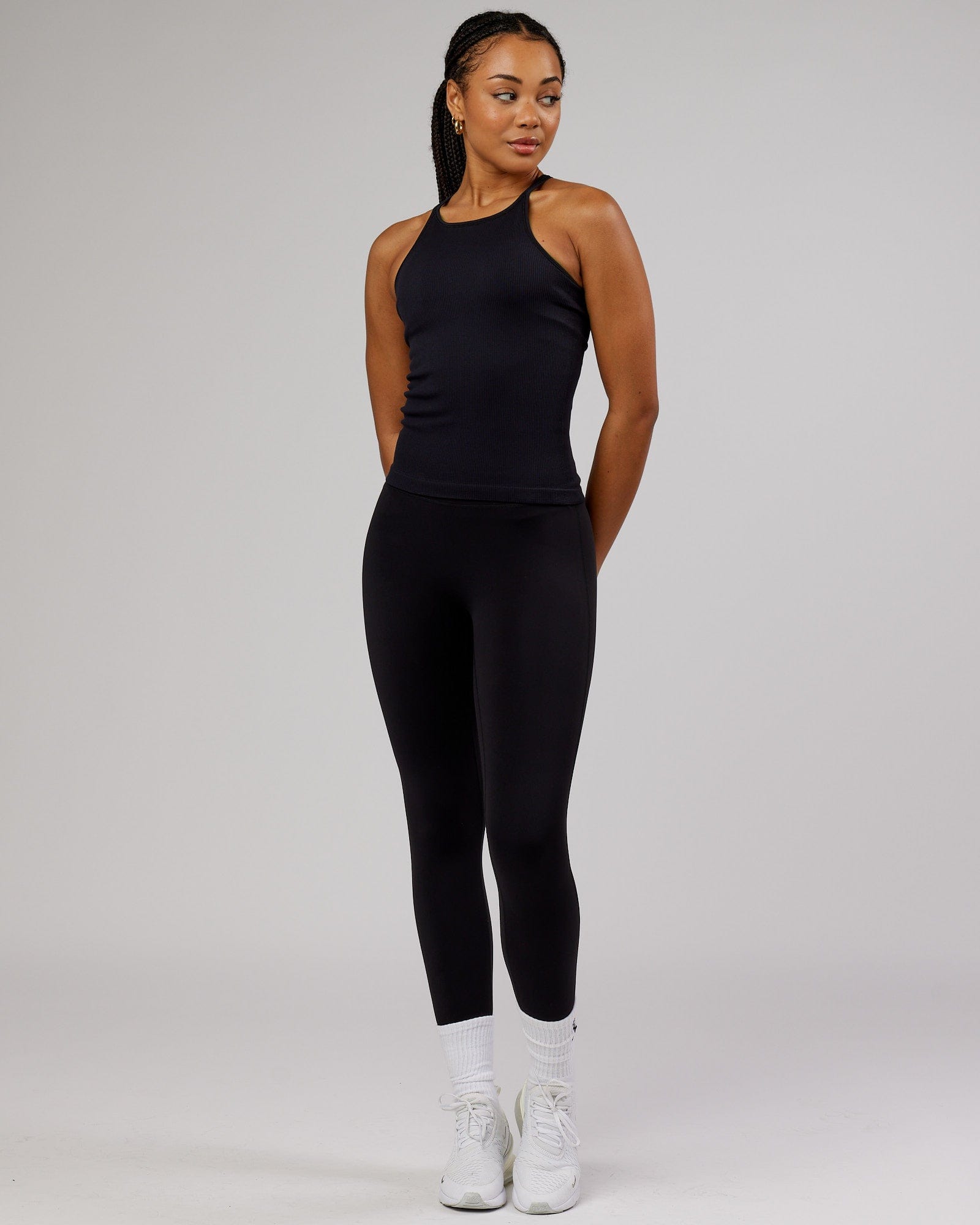 Model wearing Minimal Seamless Ribbed Tank - Black