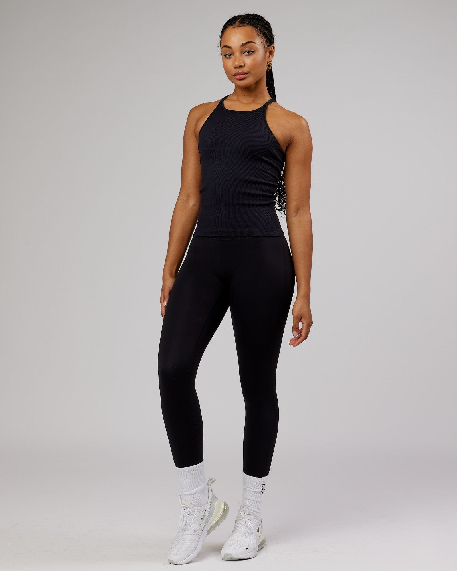 Model wearing Minimal Seamless Ribbed Tank - Black