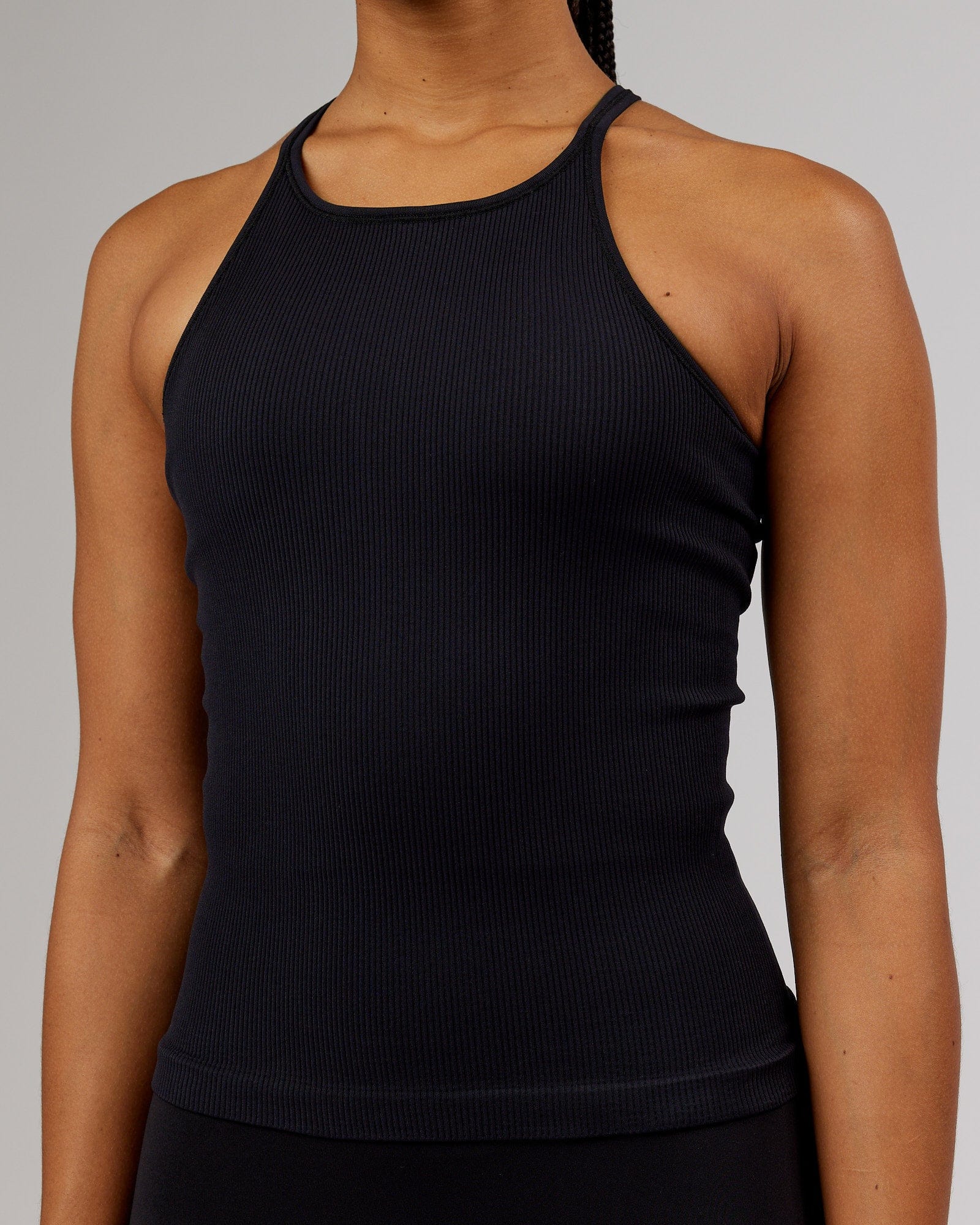 Model wearing Minimal Seamless Ribbed Tank - Black
