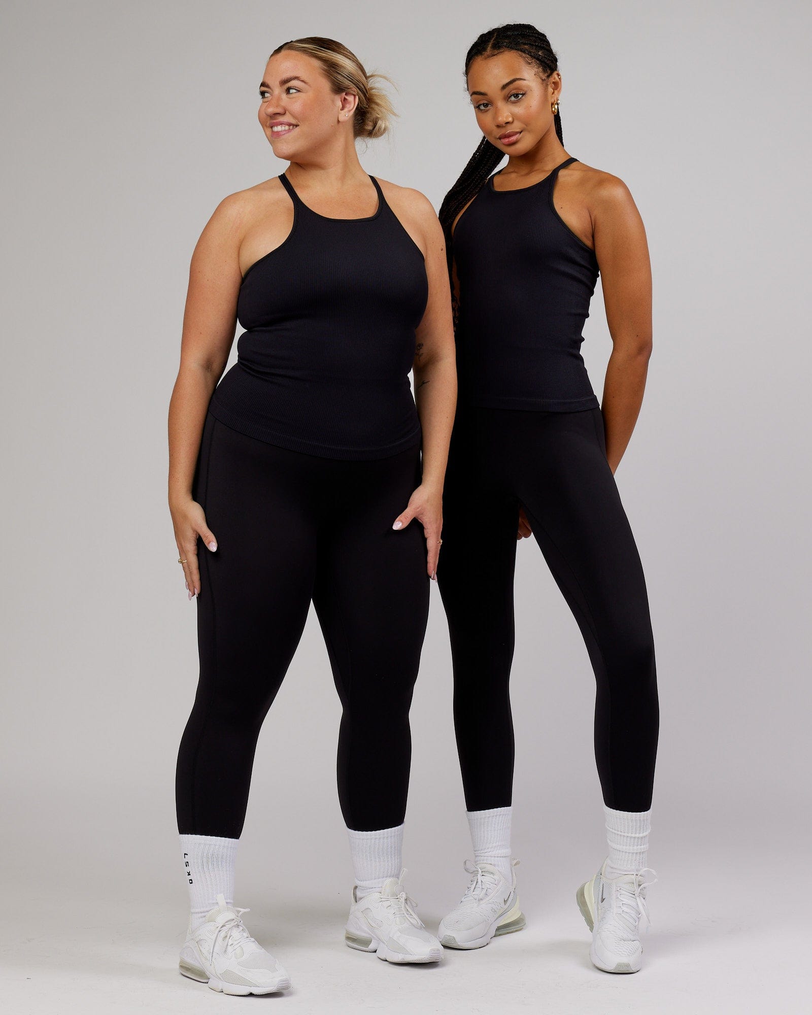 Model wearing Minimal Seamless Ribbed Tank - Black