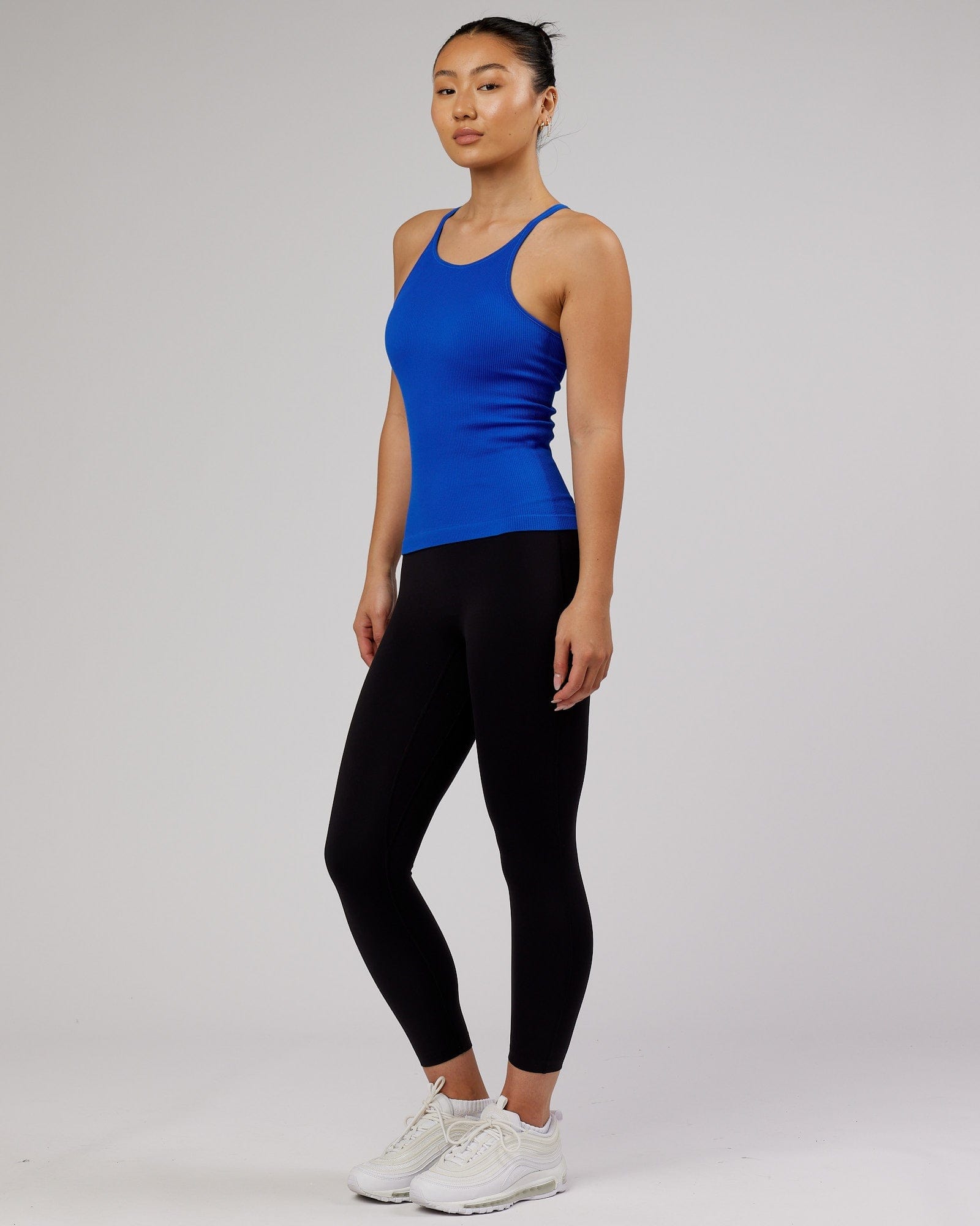 Model wearing Minimal Seamless Ribbed Tank - Strong Blue