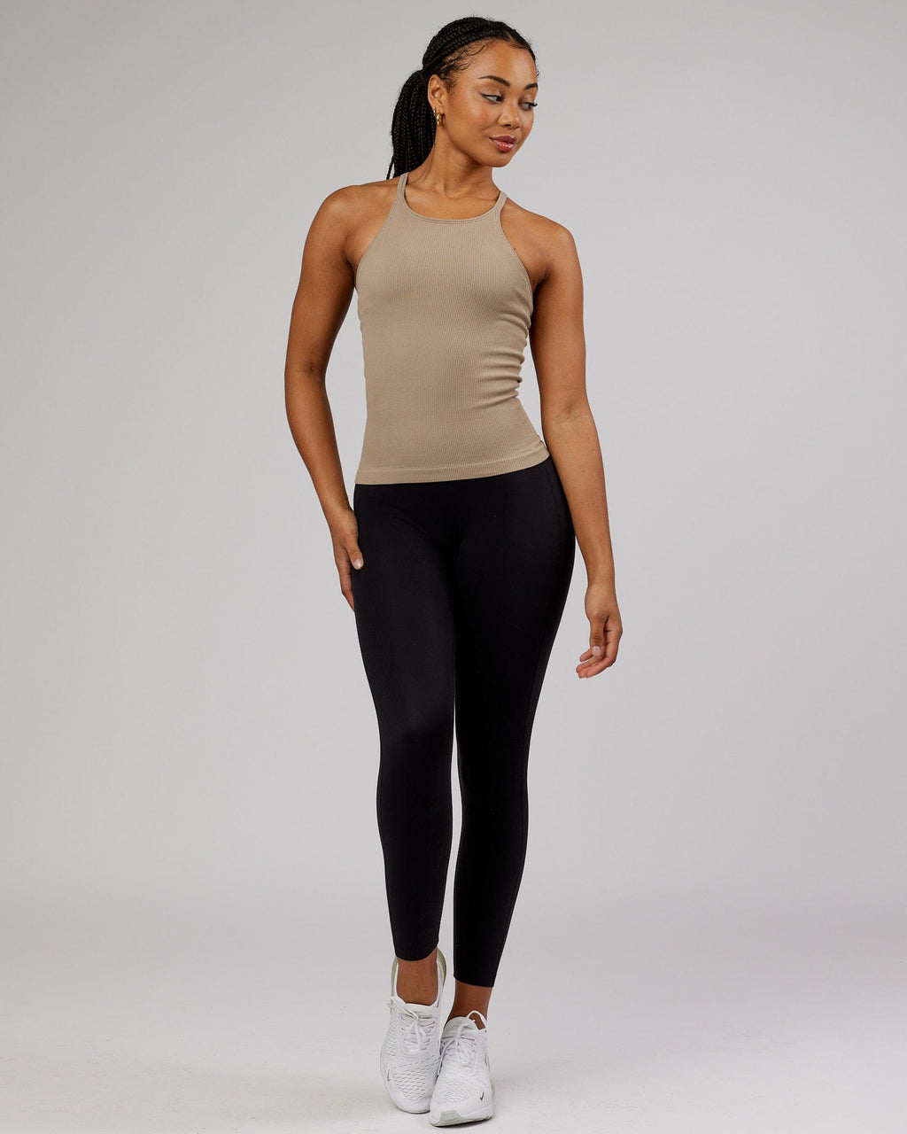 Model wearing Minimal Seamless Ribbed Tank - Taupe