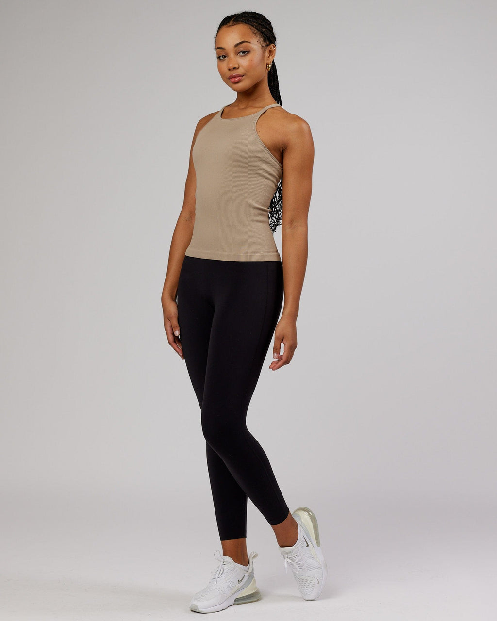 Model wearing Minimal Seamless Ribbed Tank - Taupe