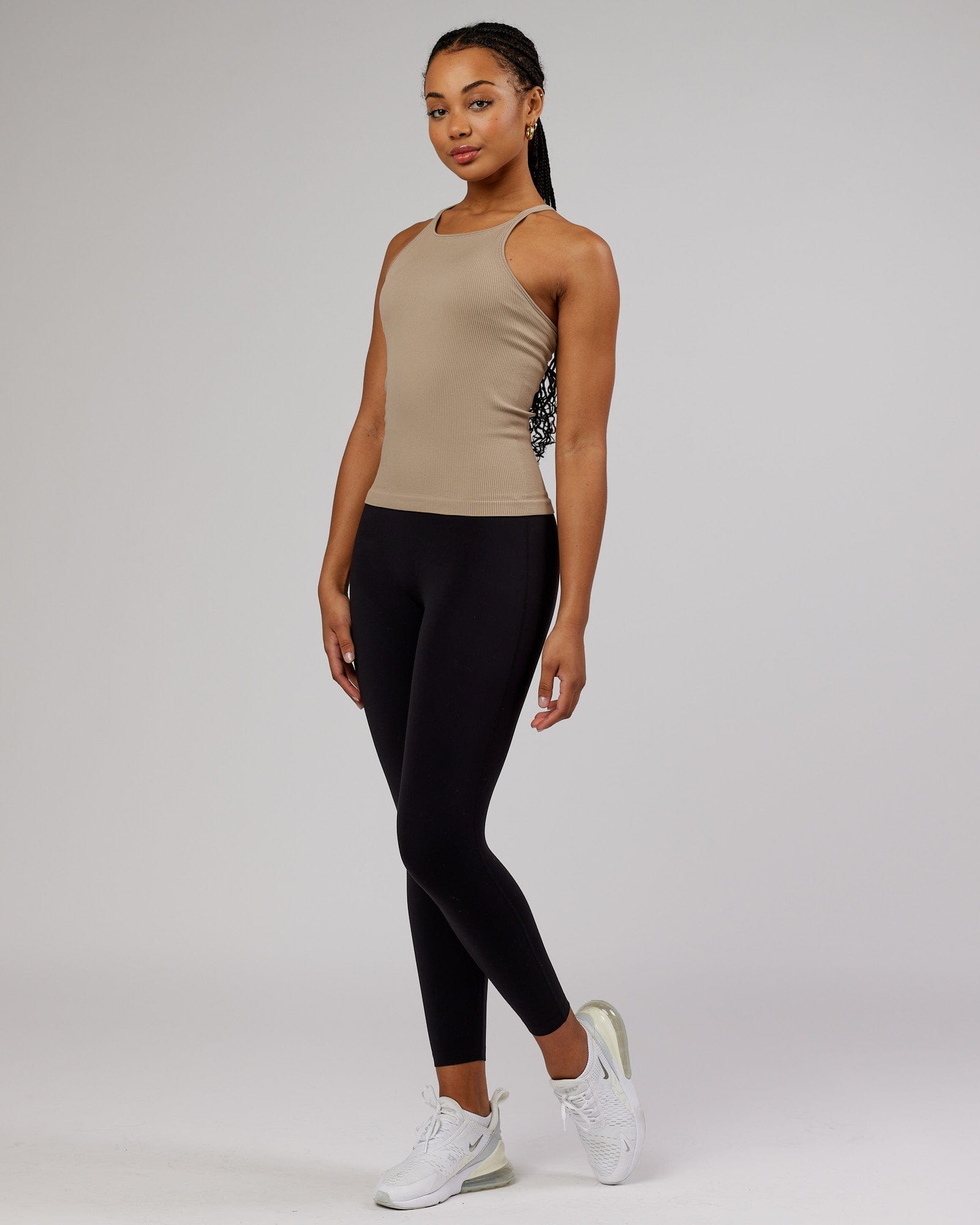 Model wearing Minimal Seamless Ribbed Tank - Taupe