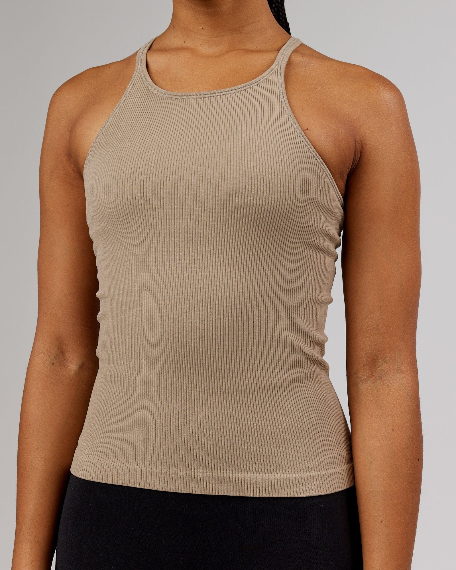 Model wearing Minimal Seamless Ribbed Tank - Taupe
