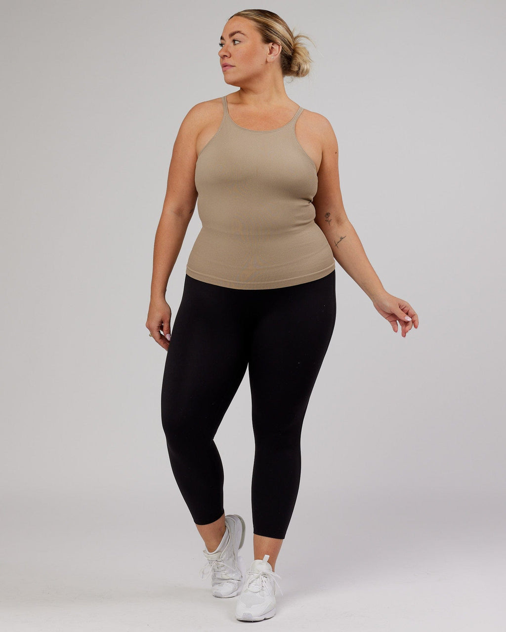 Model wearing Minimal Seamless Ribbed Tank - Taupe