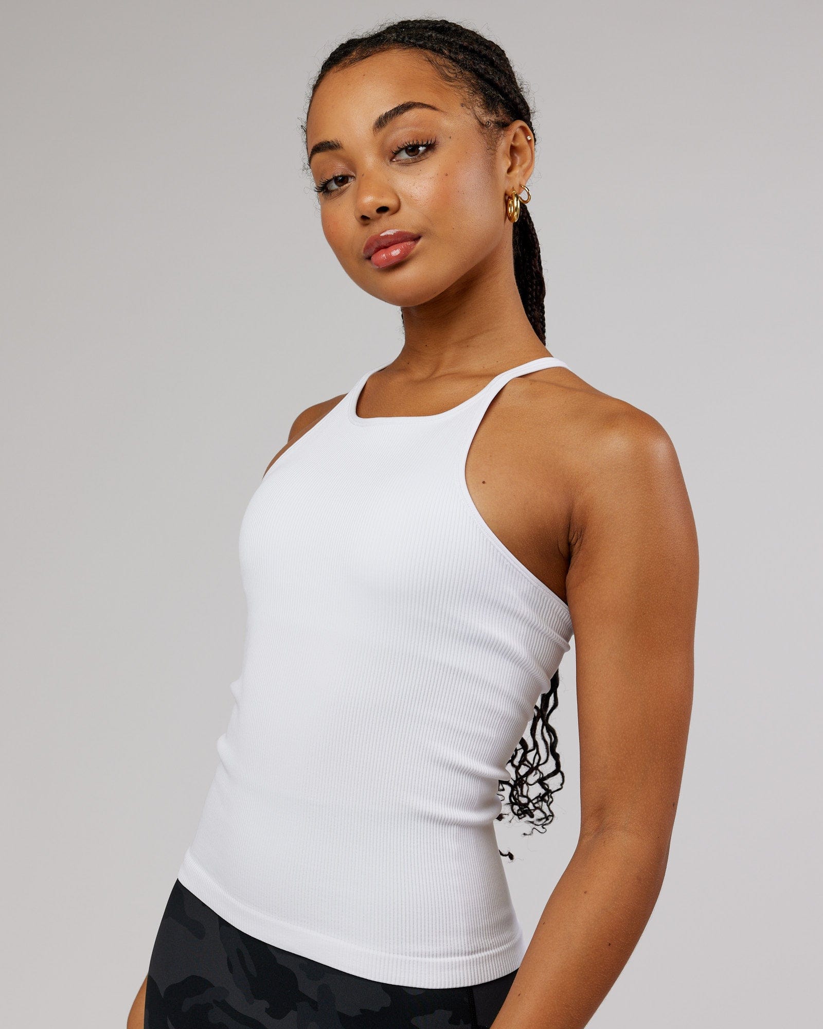 Model wearing Minimal Seamless Ribbed Tank - White