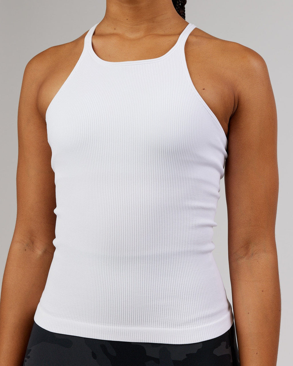 Model wearing Minimal Seamless Ribbed Tank - White