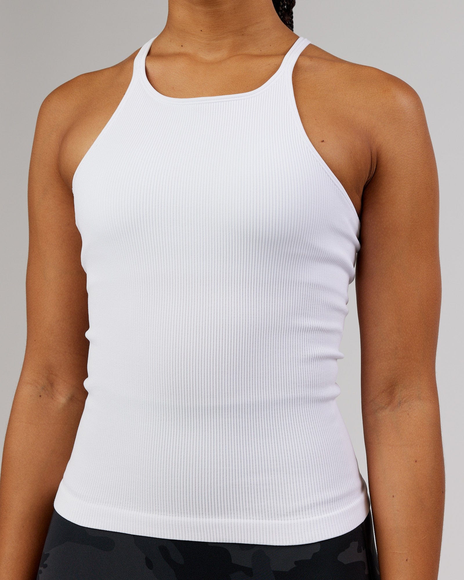 Model wearing Minimal Seamless Ribbed Tank - White
