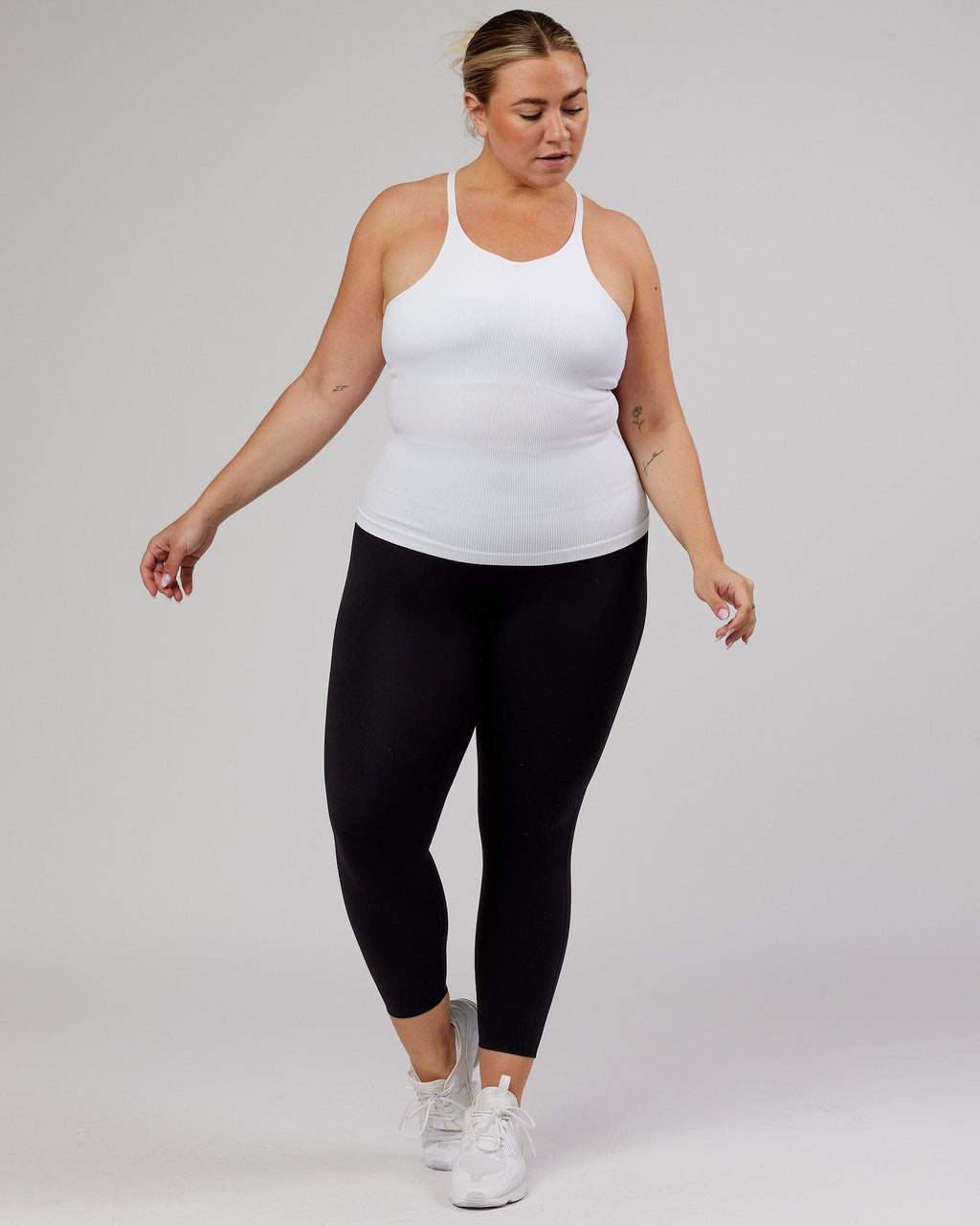 Model wearing Minimal Seamless Ribbed Tank - White
