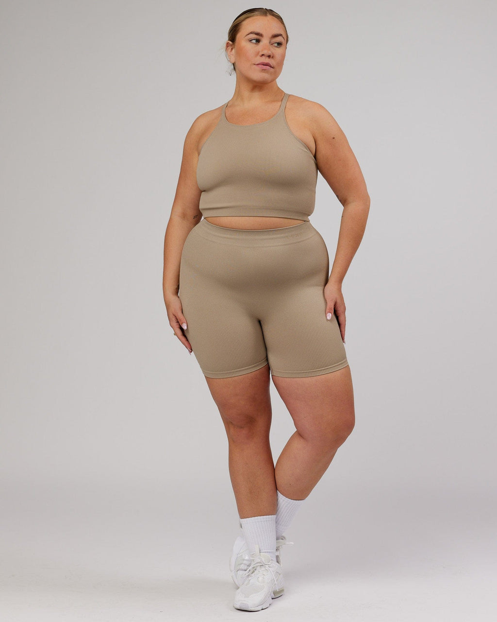 Model wearing Minimal Ribbed Seamless Shorts - Taupe