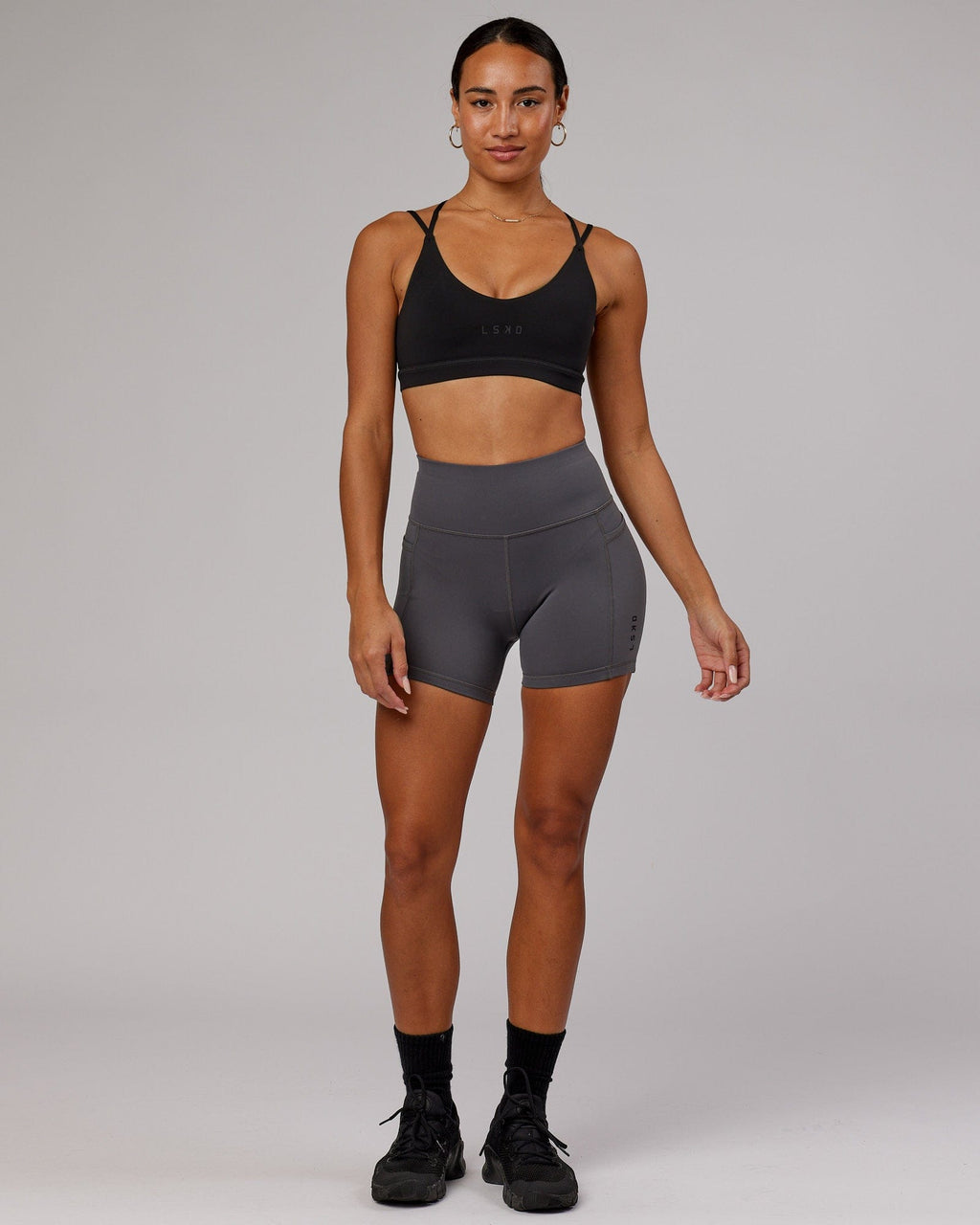Model wearing Movement Sports Bra - Black