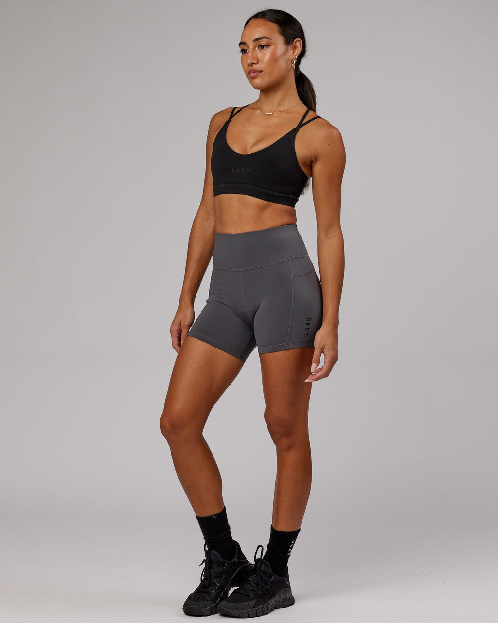 Model wearing Movement Sports Bra - Black