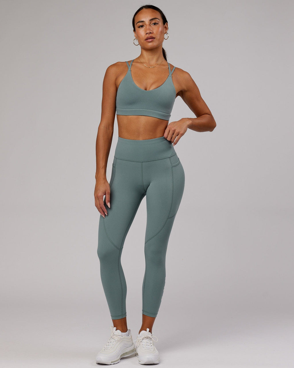 Model wearing Movement Sports Bra - Eclipse