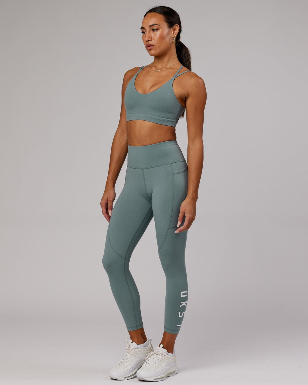 Model wearing Movement Sports Bra - Eclipse