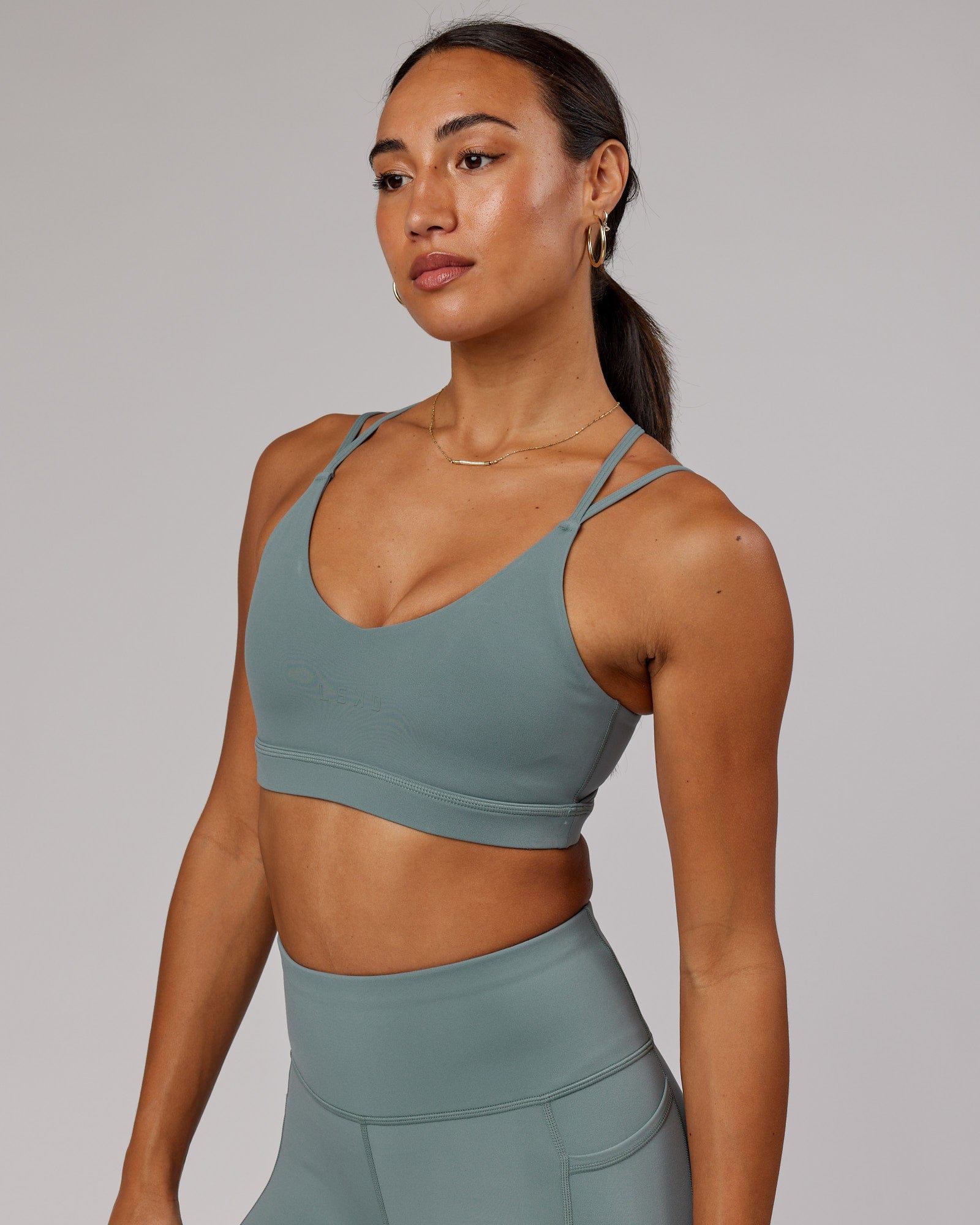 Model wearing Movement Sports Bra - Eclipse