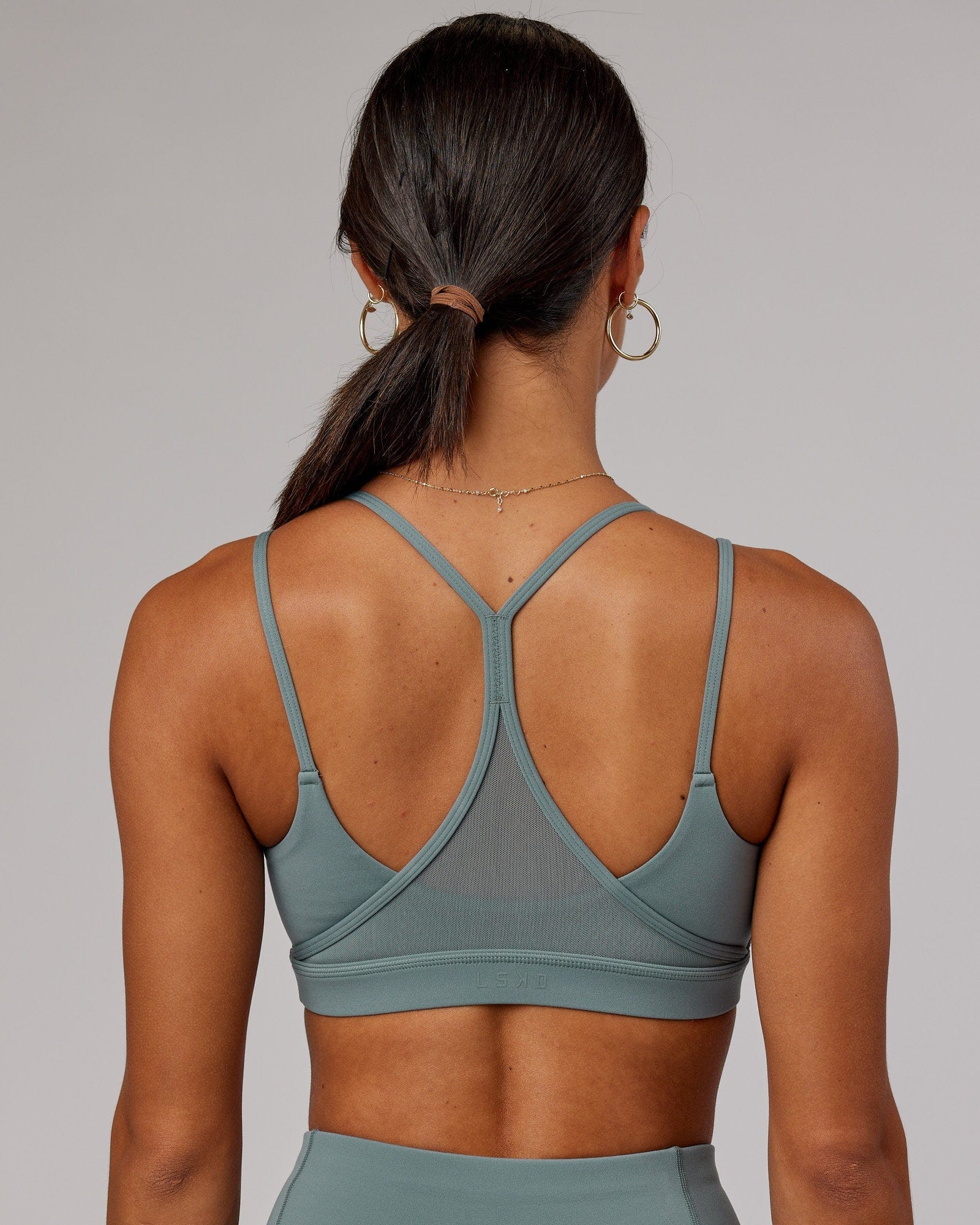 Model wearing Movement Sports Bra - Eclipse