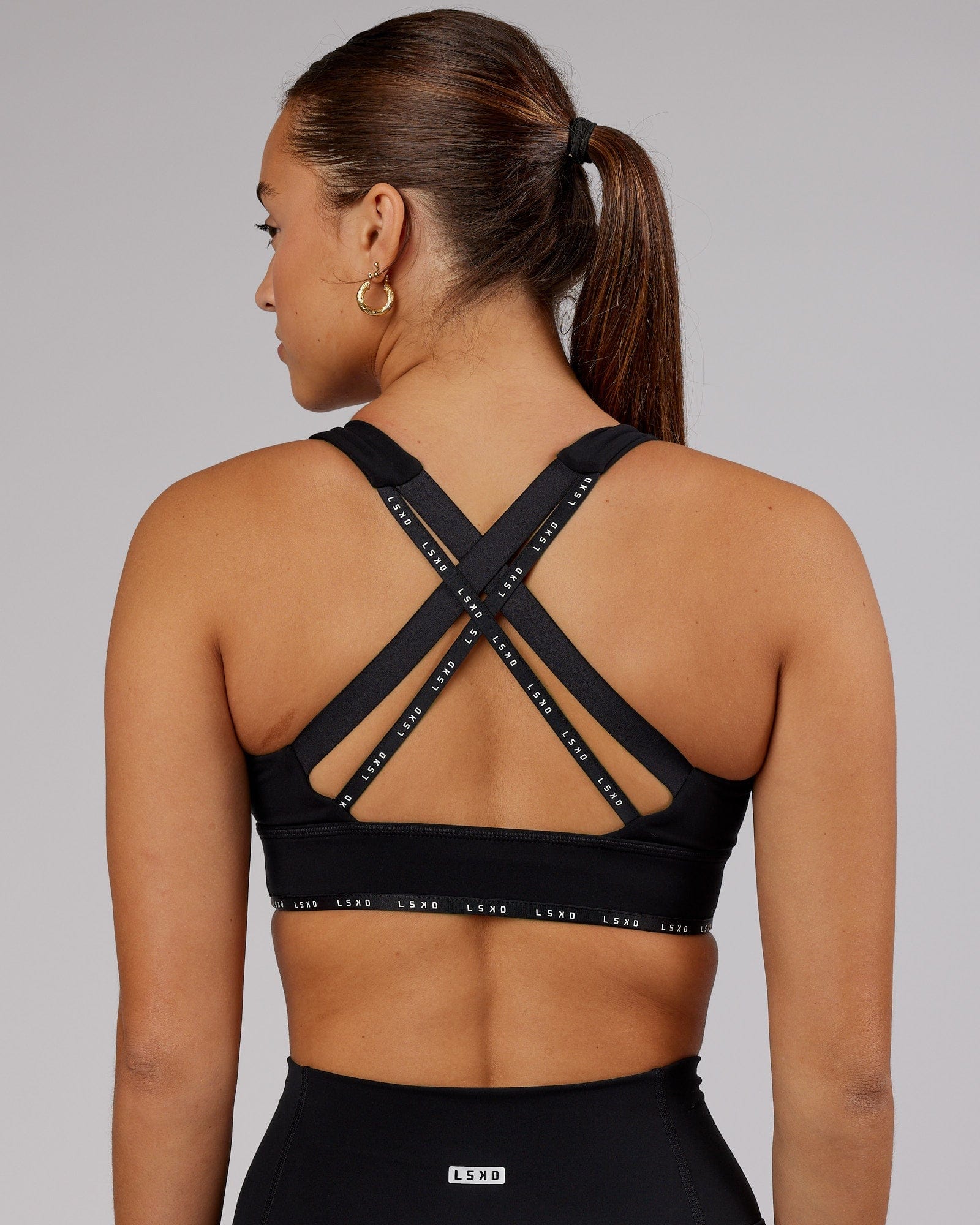Model wearing MVP Sports Bra - Black