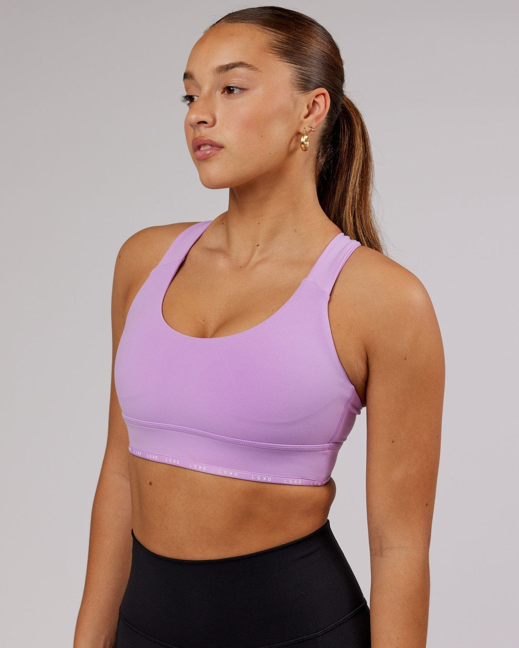 Model wearing MVP Sports Bra - Lilac