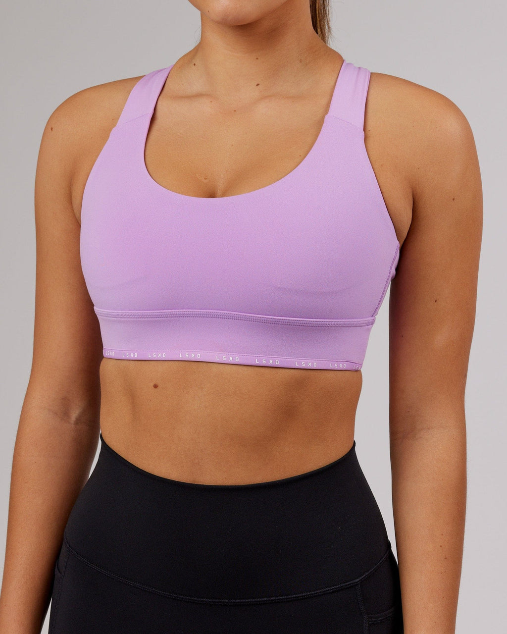 Model wearing MVP Sports Bra - Lilac