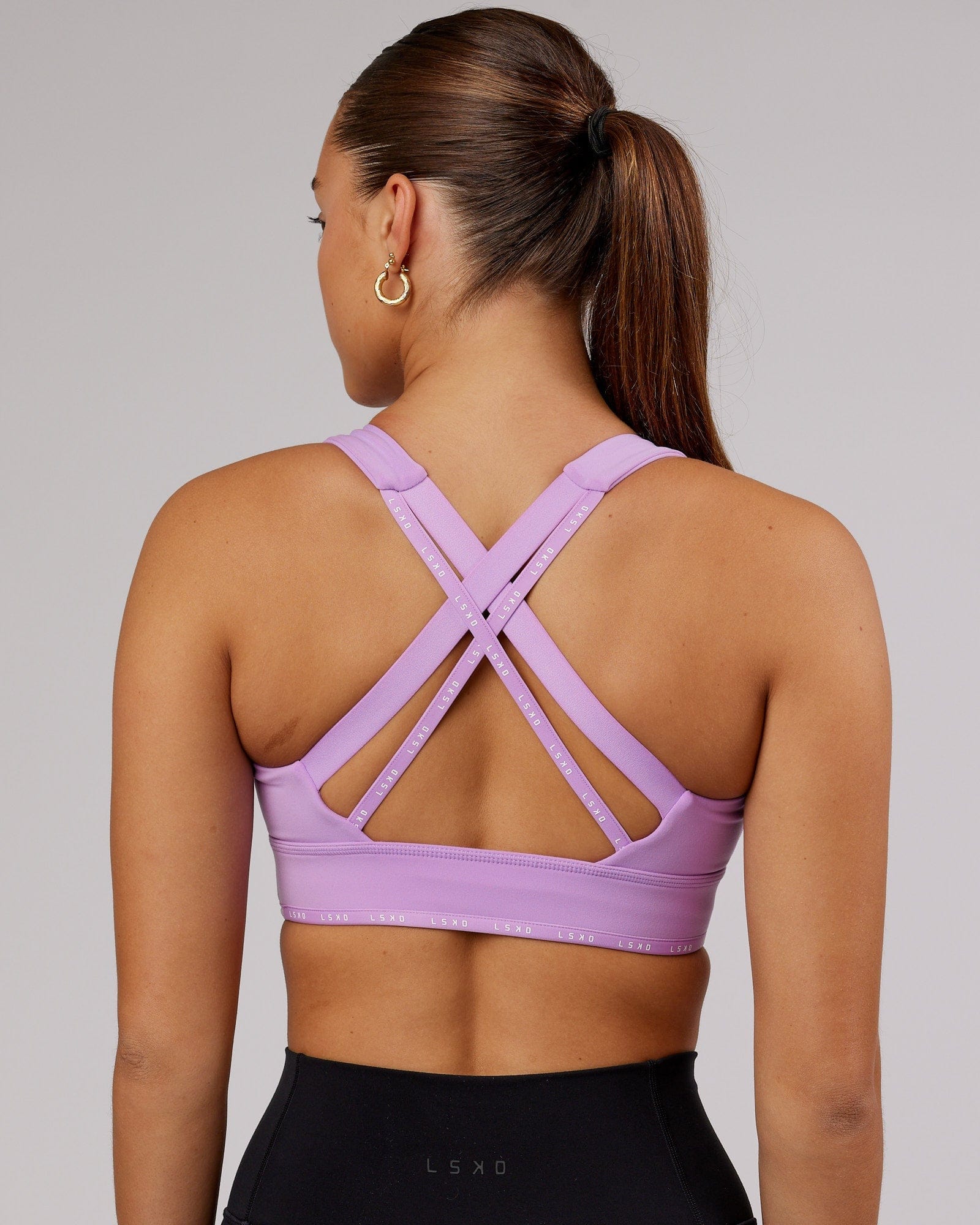 Model wearing MVP Sports Bra - Lilac