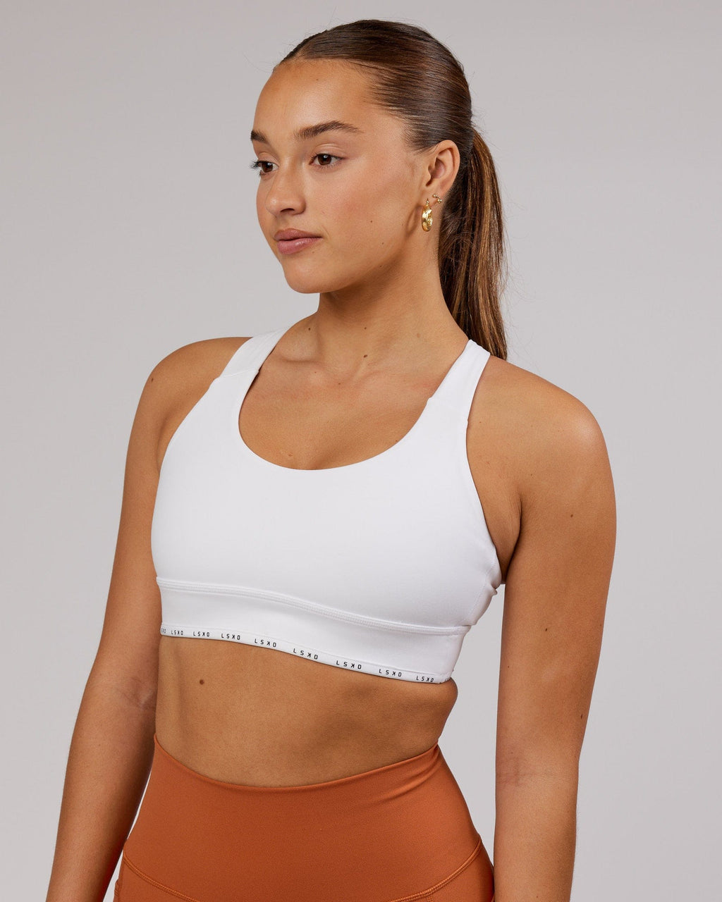 Model wearing MVP Sports Bra - White