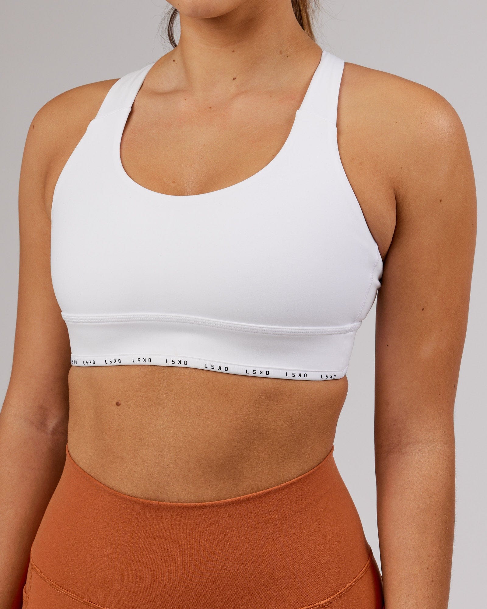 Model wearing MVP Sports Bra - White