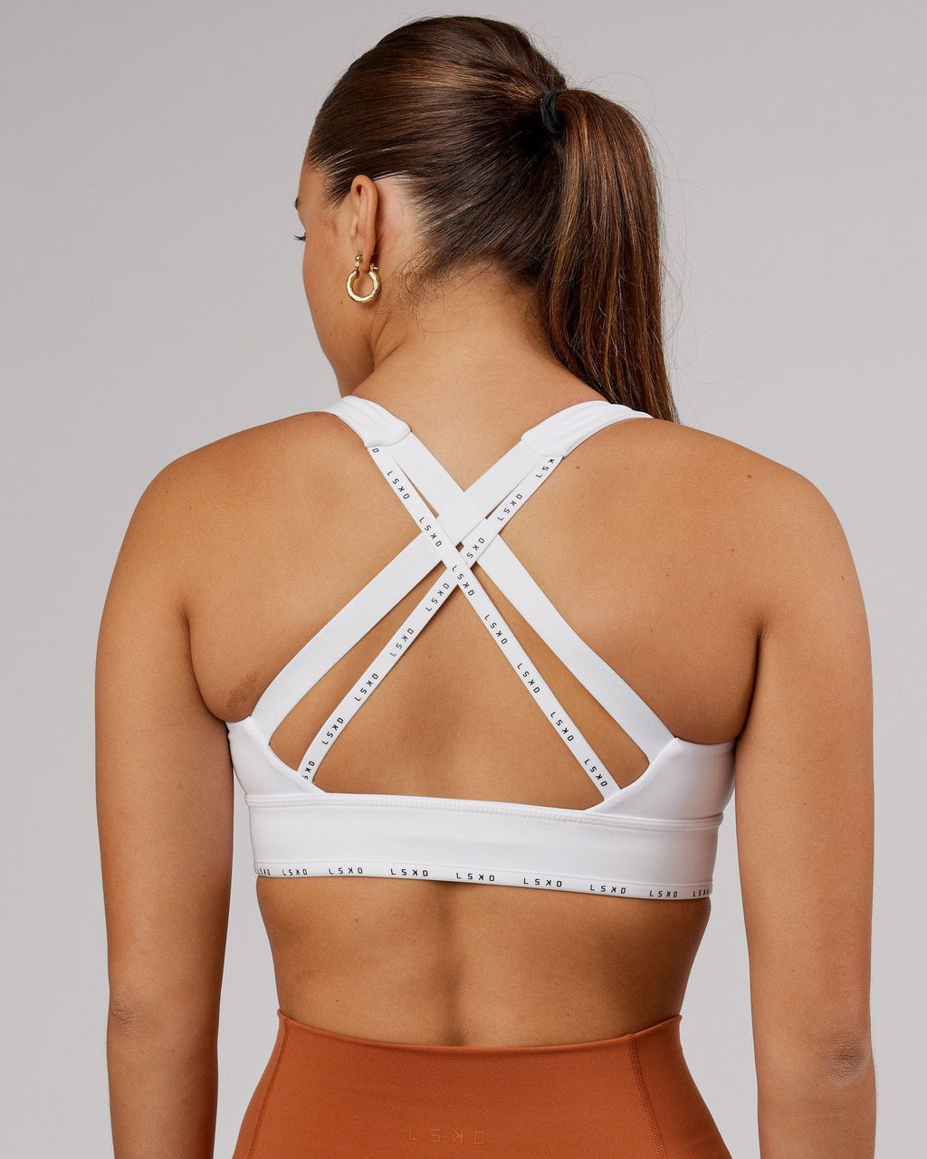 Model wearing MVP Sports Bra - White