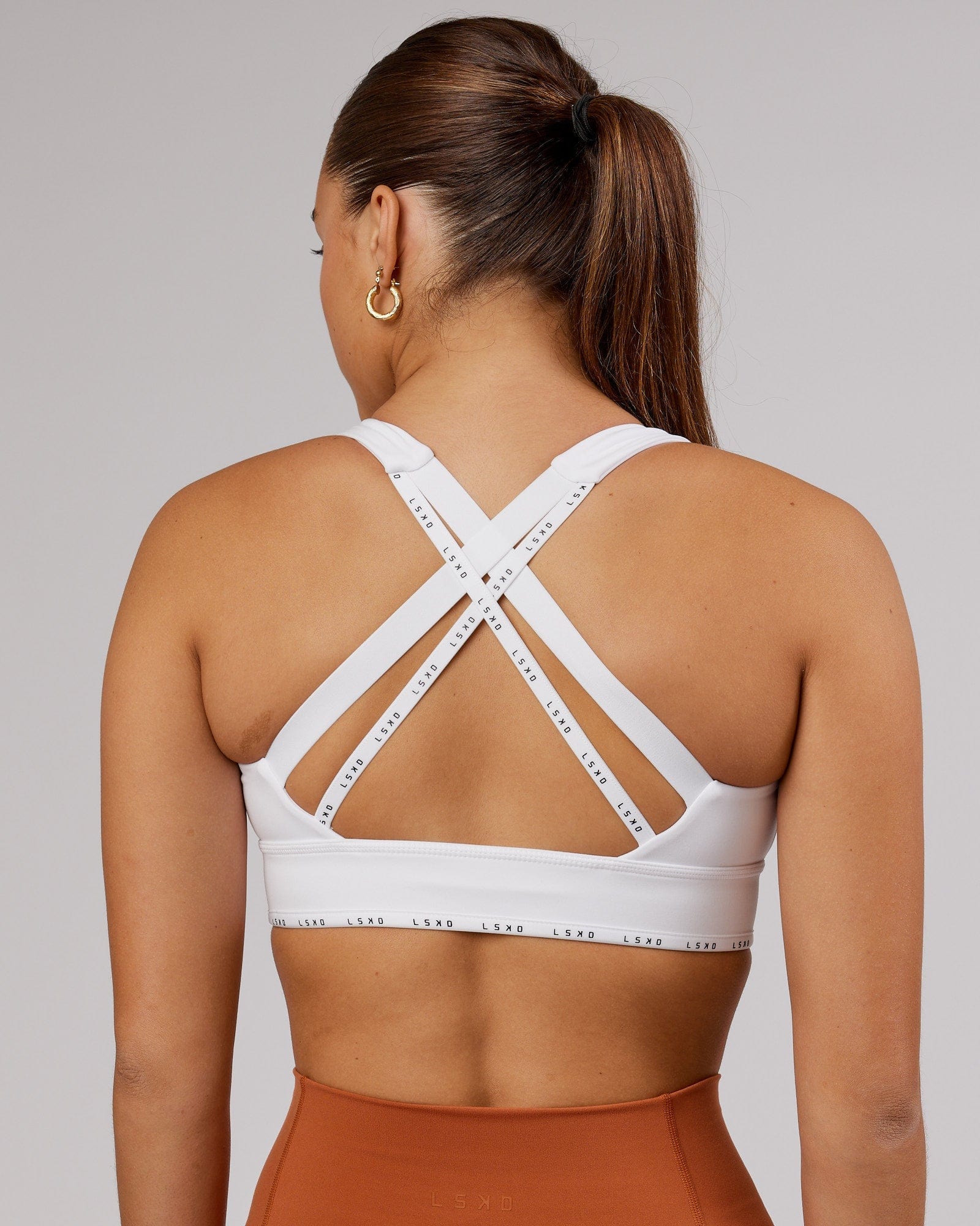 Model wearing MVP Sports Bra - White