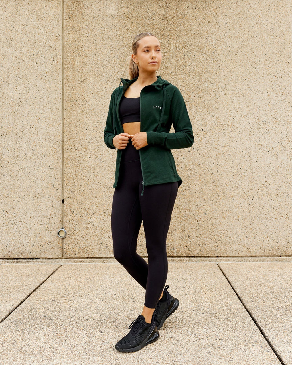 Model wearing PB Zip Through Hoodie - Forest-Tonal